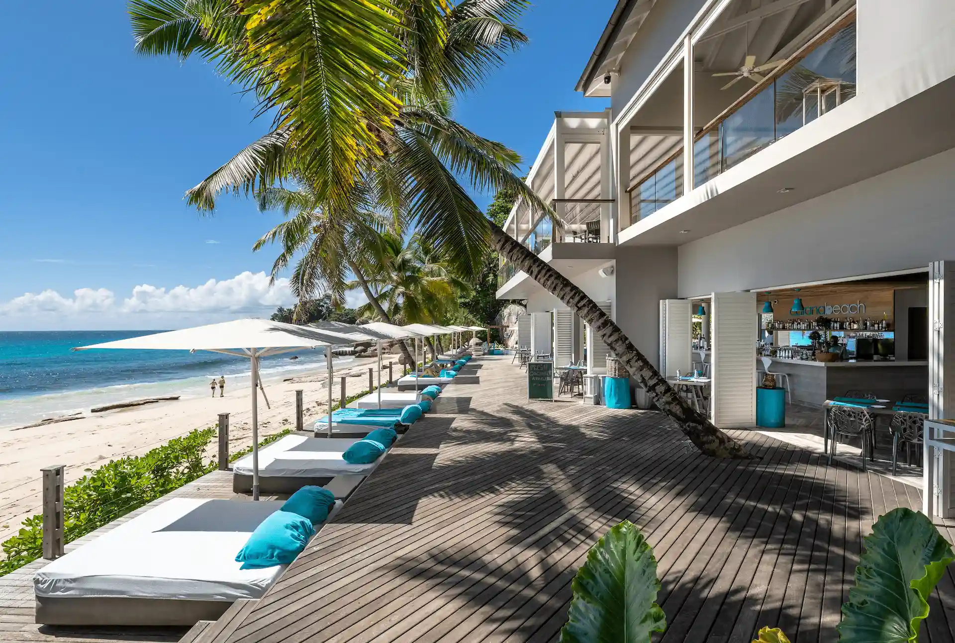 carana beach hotel seychelles beach bar with oceanfront seating