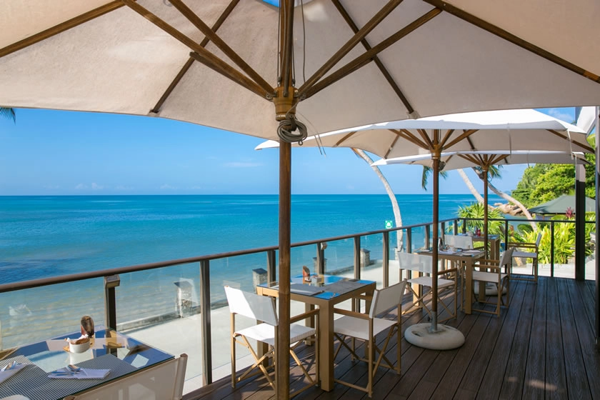 coco de mer seychelles hibiscus restaurant with oceanfront dining, tropical décor, and locally inspired cuisine