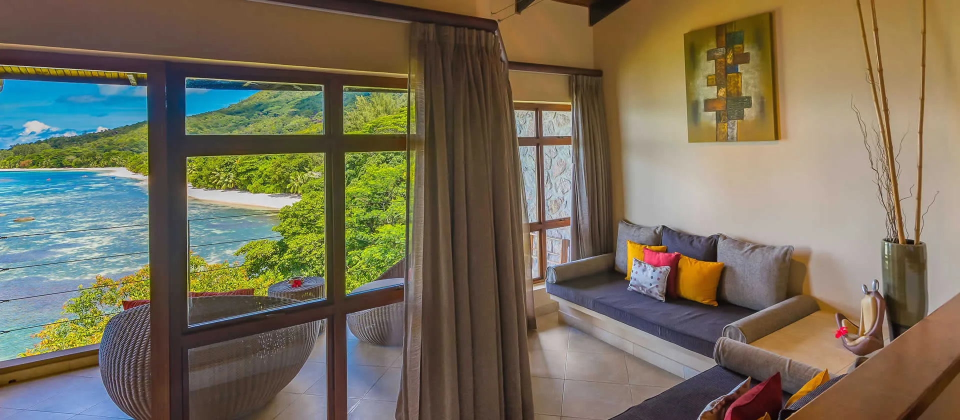 coco de mer seychelles junior suite view of turquoise ocean, private balcony, and lush tropical gardens