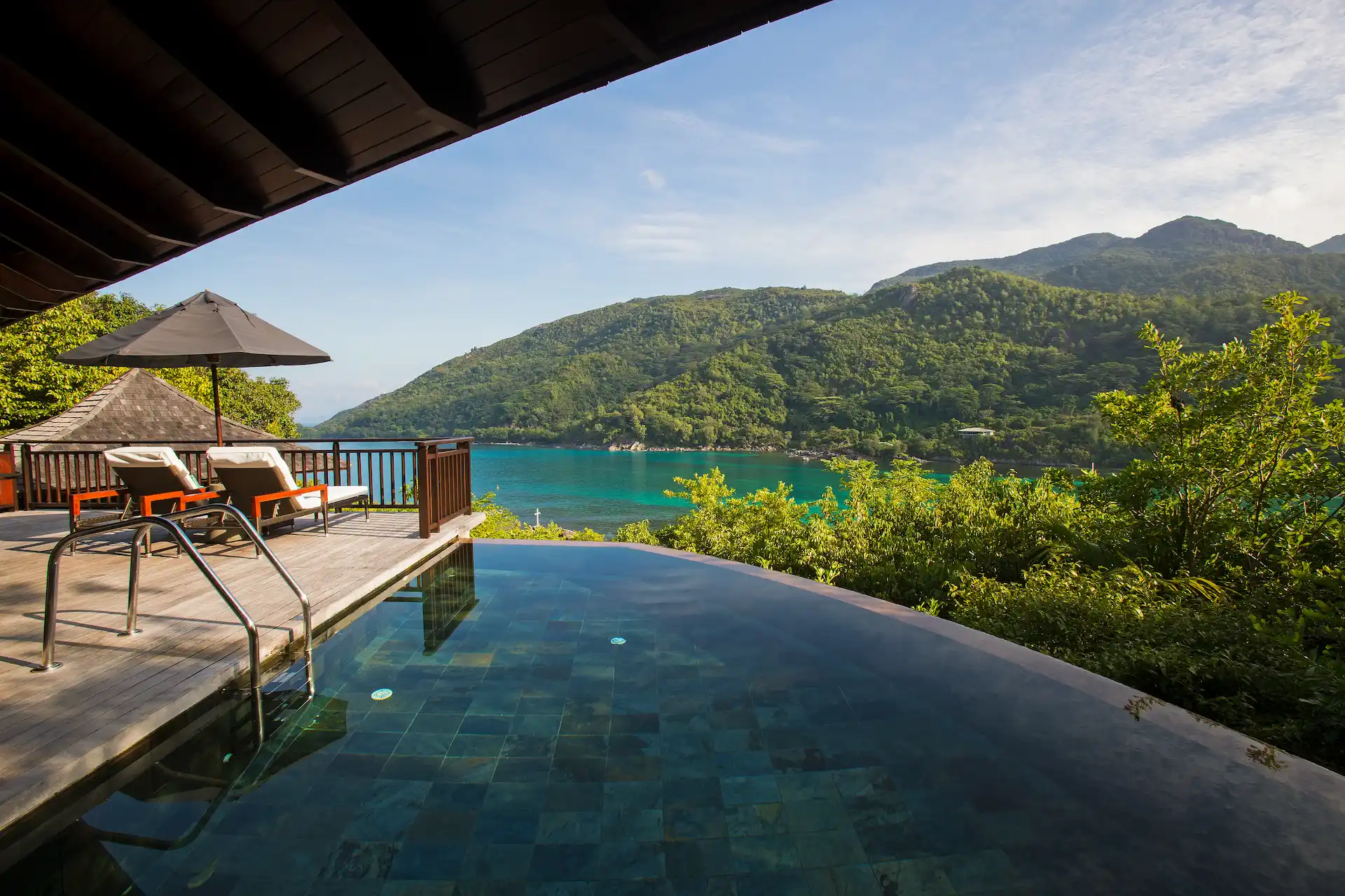 constance ephelia hillside villa bedroom pool view lounge area