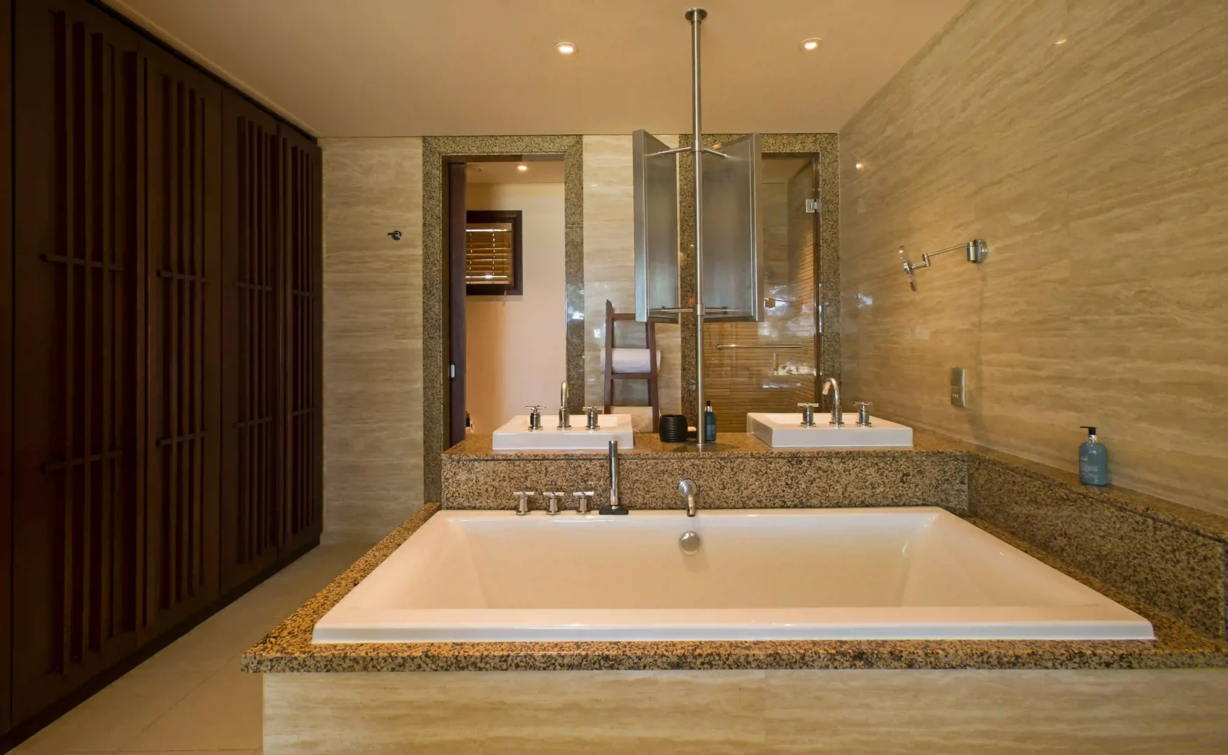 constance ephelia junior suite bathroom with bathtub shower and tropical design