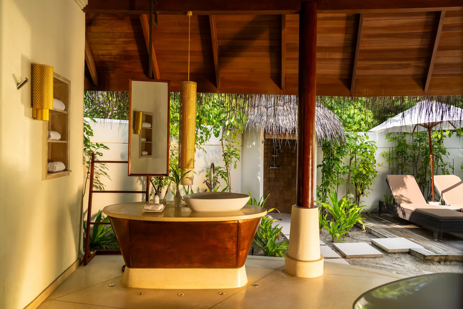 constance halaveli maldives beach villa bathroom featuring a stylish sink area