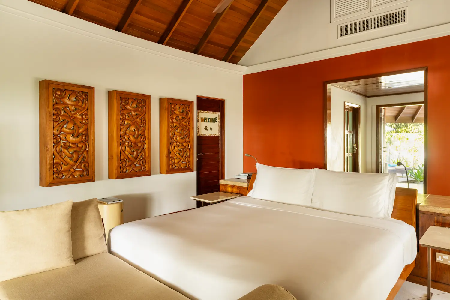 constance halaveli maldives beach villa bedroom with a bright and relaxing view