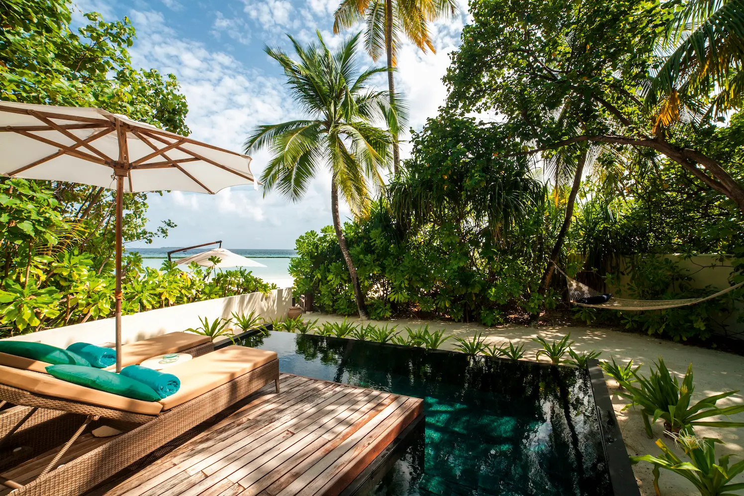 constance halaveli maldives beach villa with a private pool in a relaxing setting