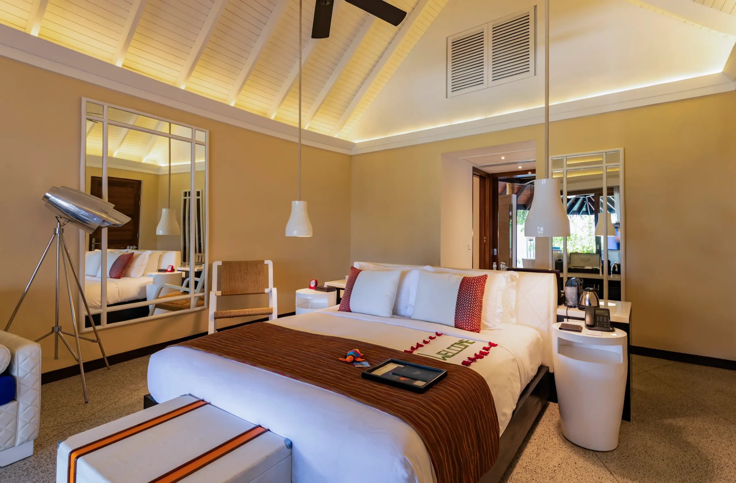 constance halaveli maldives beach villa two bedrooms featuring a spacious king bedroom setting