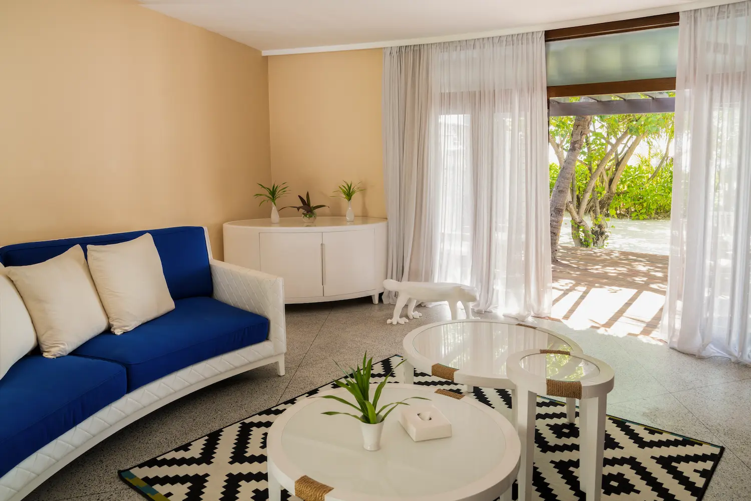 constance halaveli maldives beach villa two bedrooms featuring a comfortable lounge area
