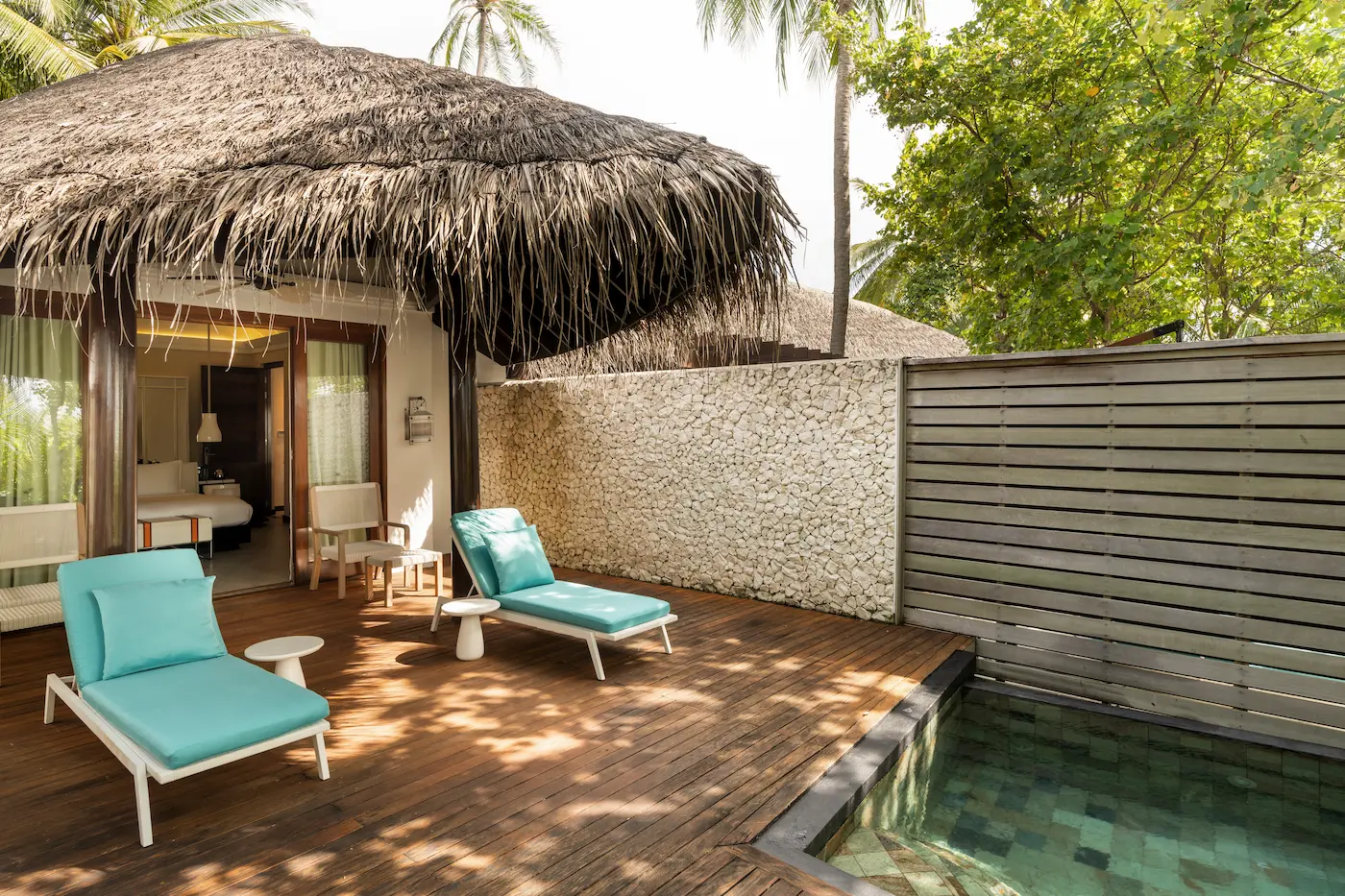 constance halaveli maldives beach villa two bedrooms featuring a relaxing sunbed area