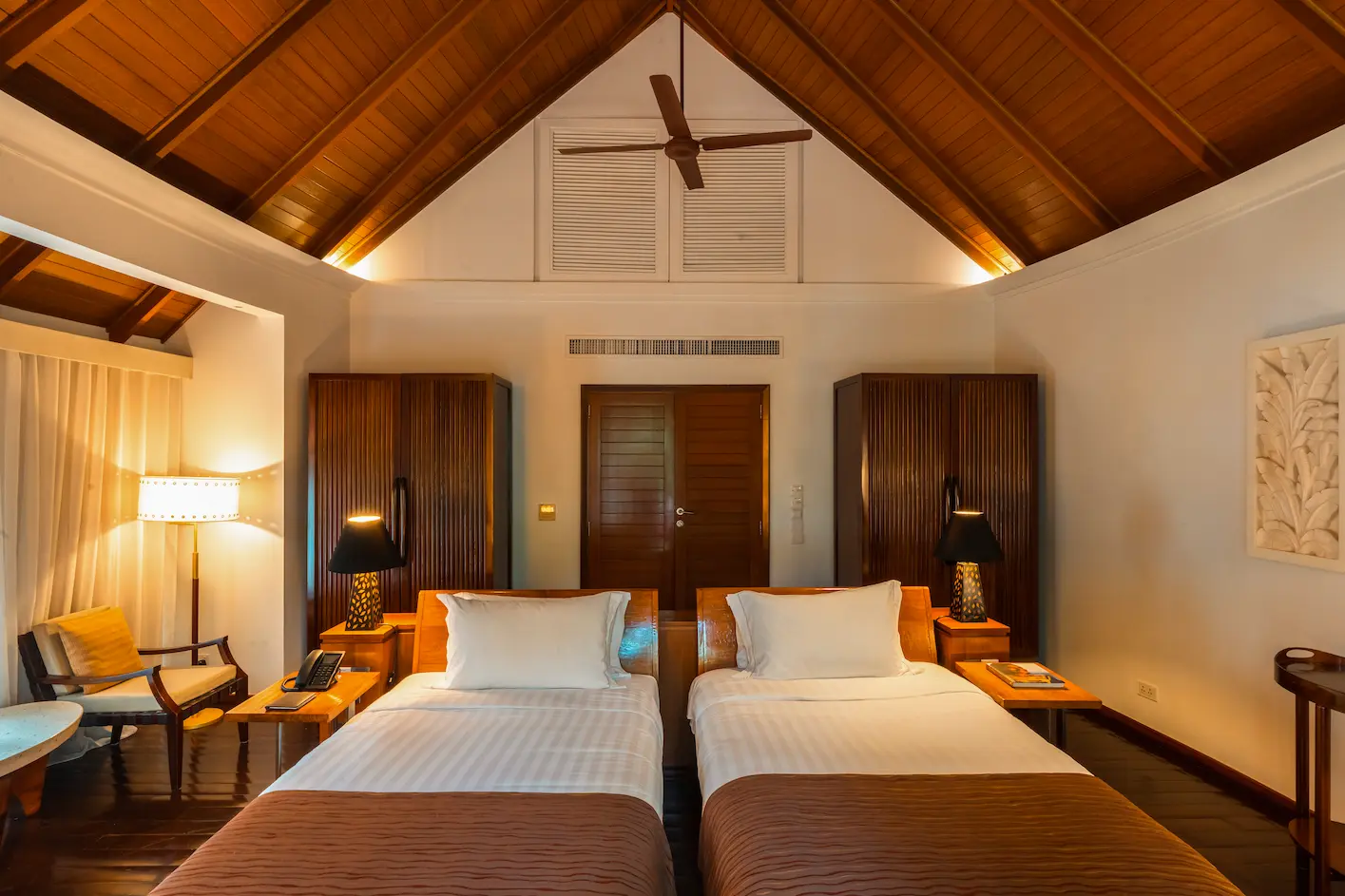 constance halaveli maldives double storey beach villa bedroom offering a calm and spacious setting