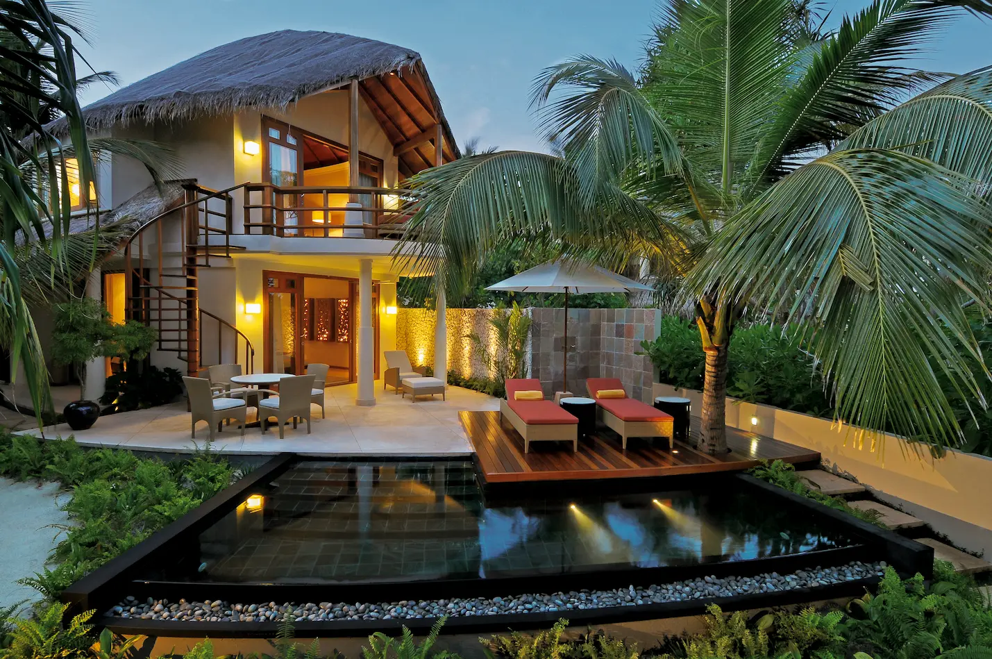 constance halaveli maldives double storey beach villa featuring a private pool area