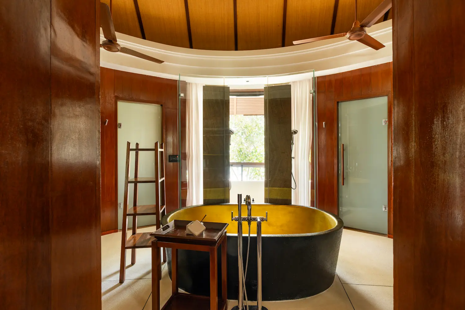 constance halaveli maldives presidential villa featuring an elegant and spacious bathroom area