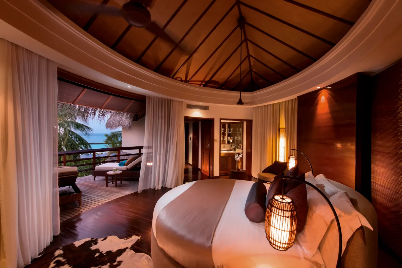 constance halaveli maldives presidential villa master bedroom featuring an elegant and spacious setting