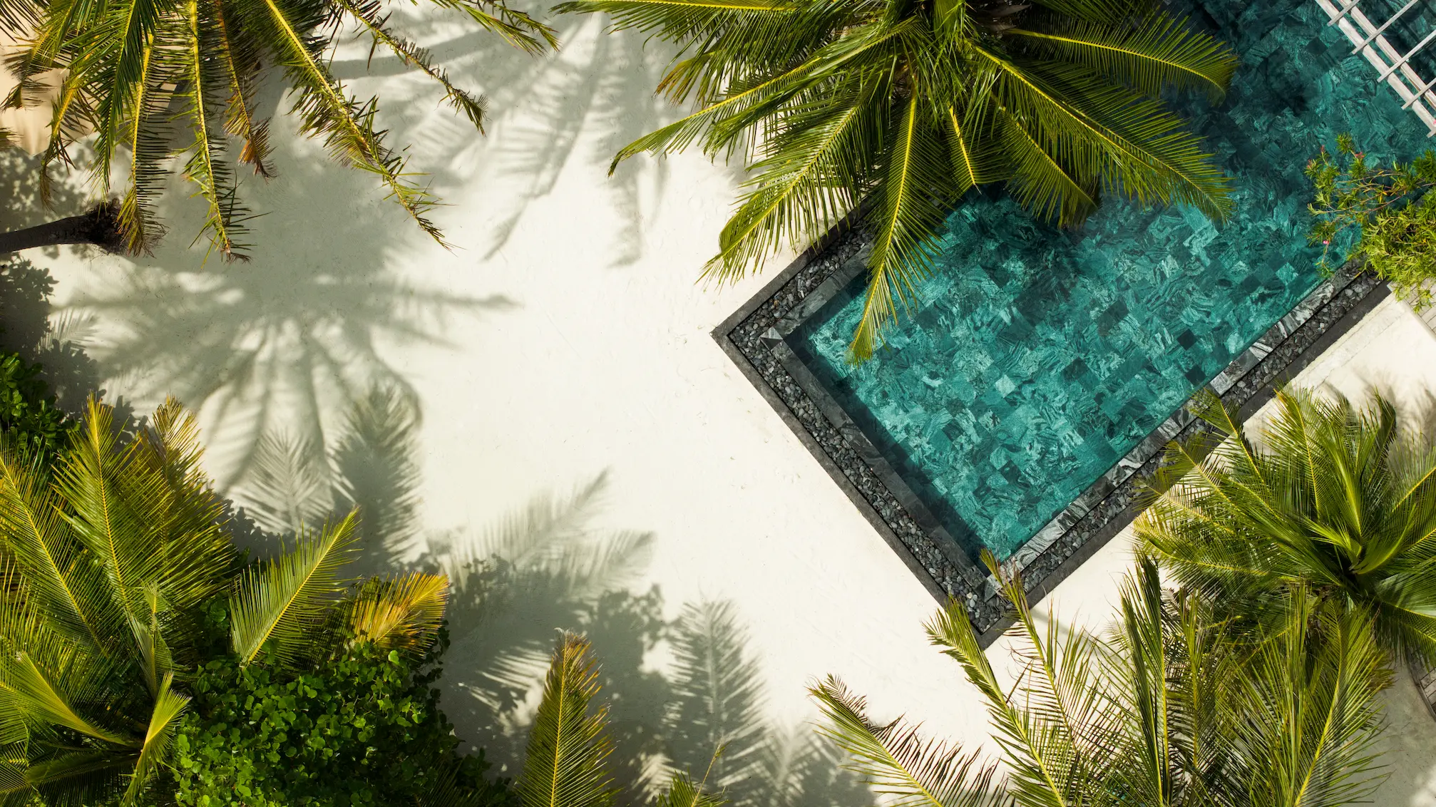 constance halaveli maldives presidential villa pool captured from an aerial view