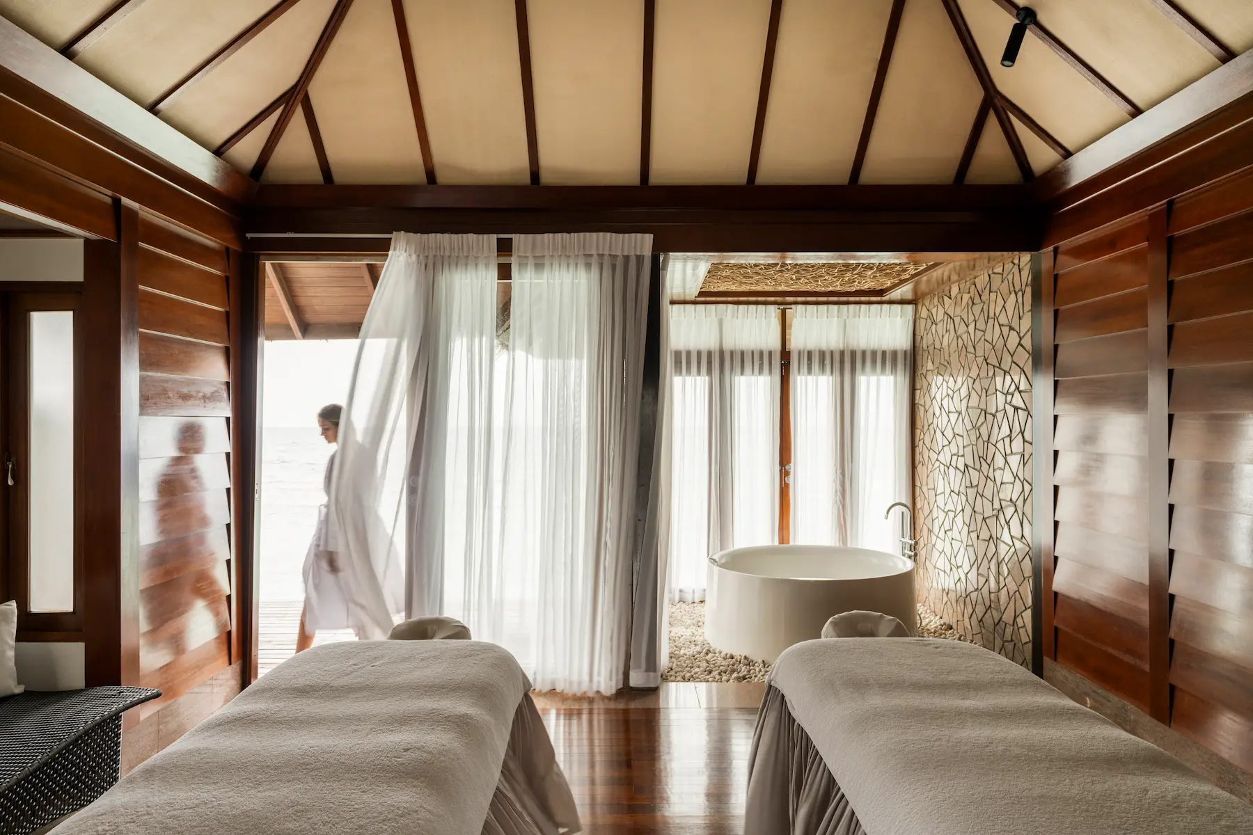 constance halaveli maldives spa featuring a calm and elegant interior setting