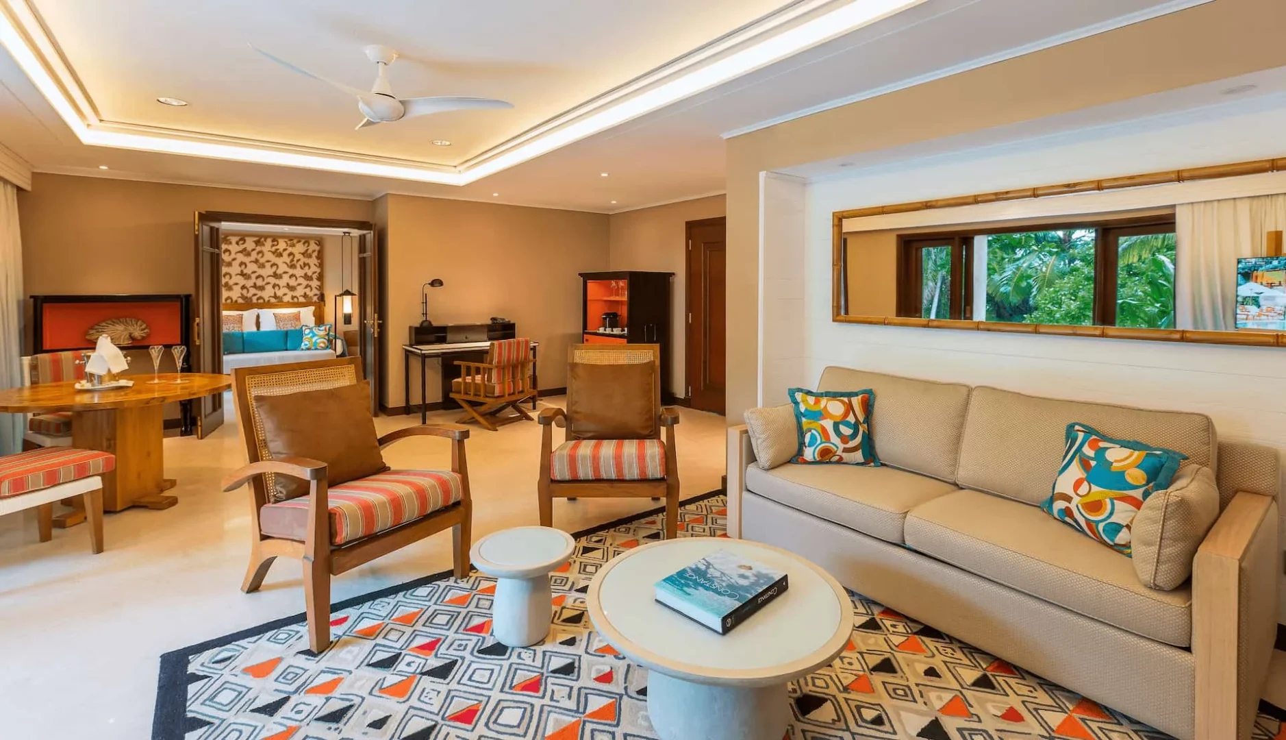 constance lemuria senior suite sofa area with comfortable seating and tropical decor