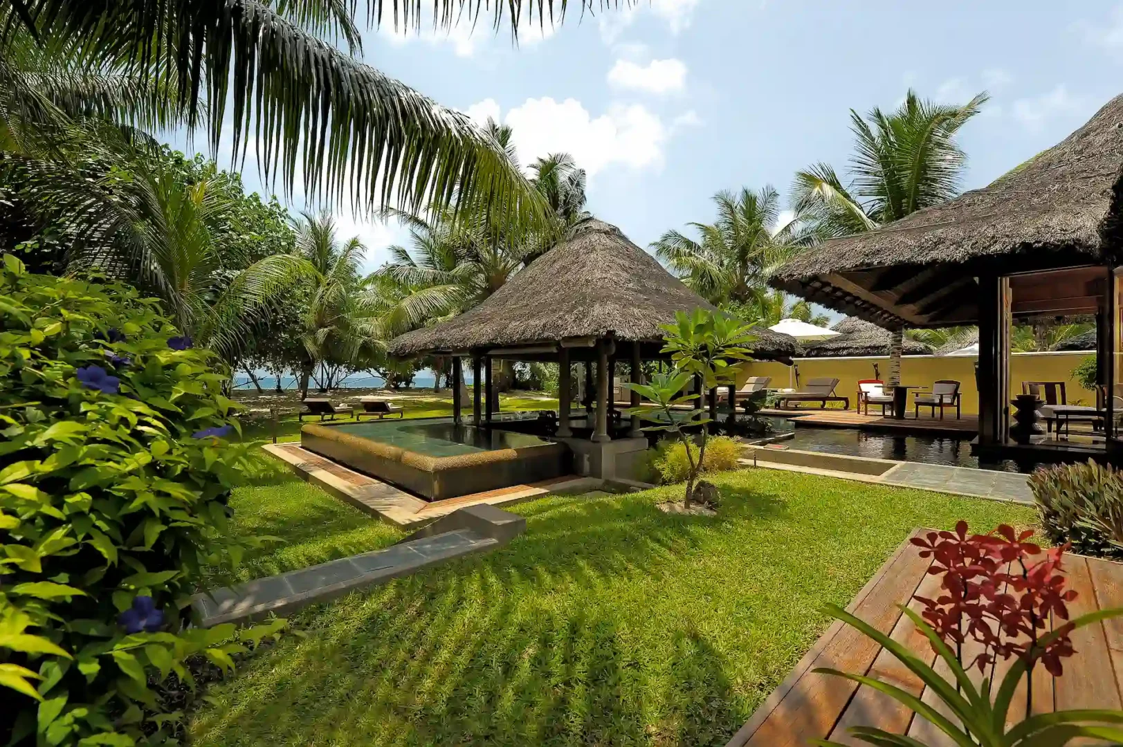 constance lemuria villa garden with lush tropical plants and pathways