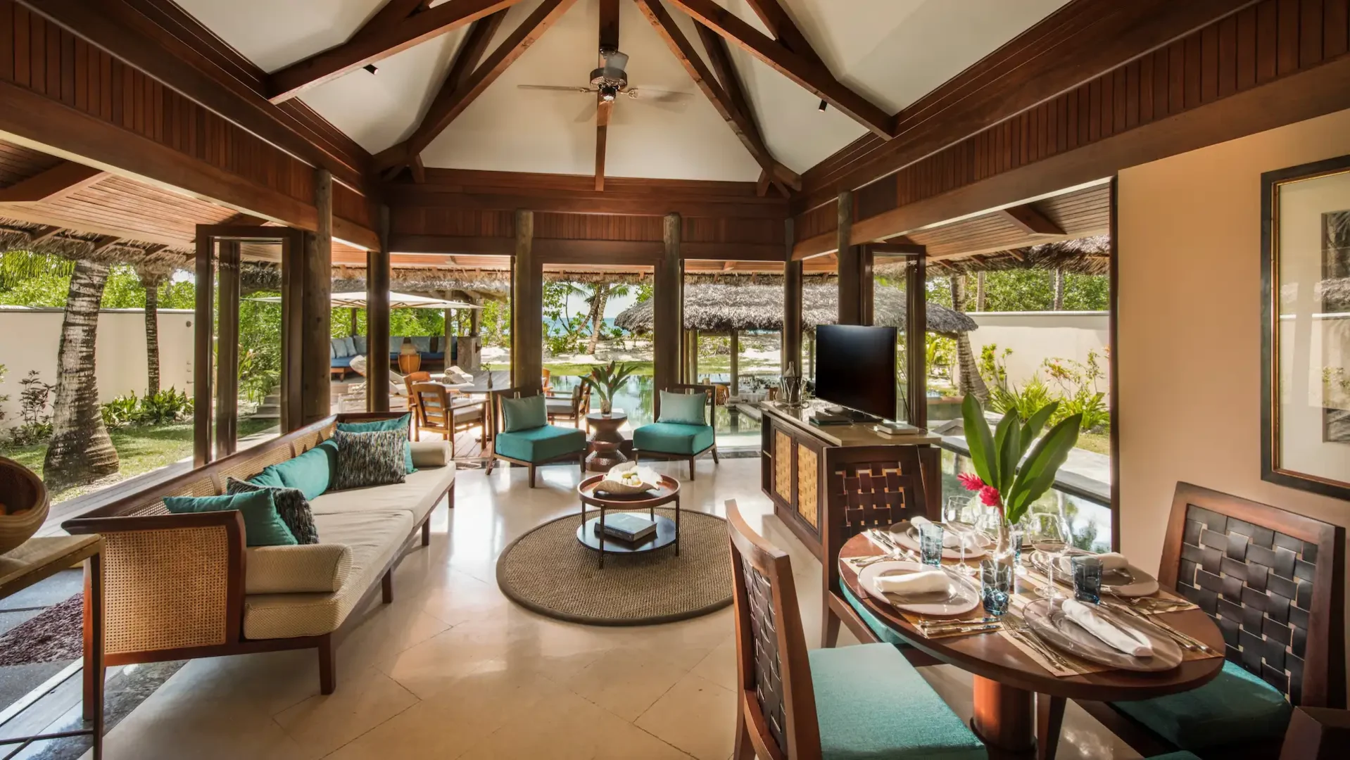 constance lemuria villa lounge area with comfortable seating and tropical decor
