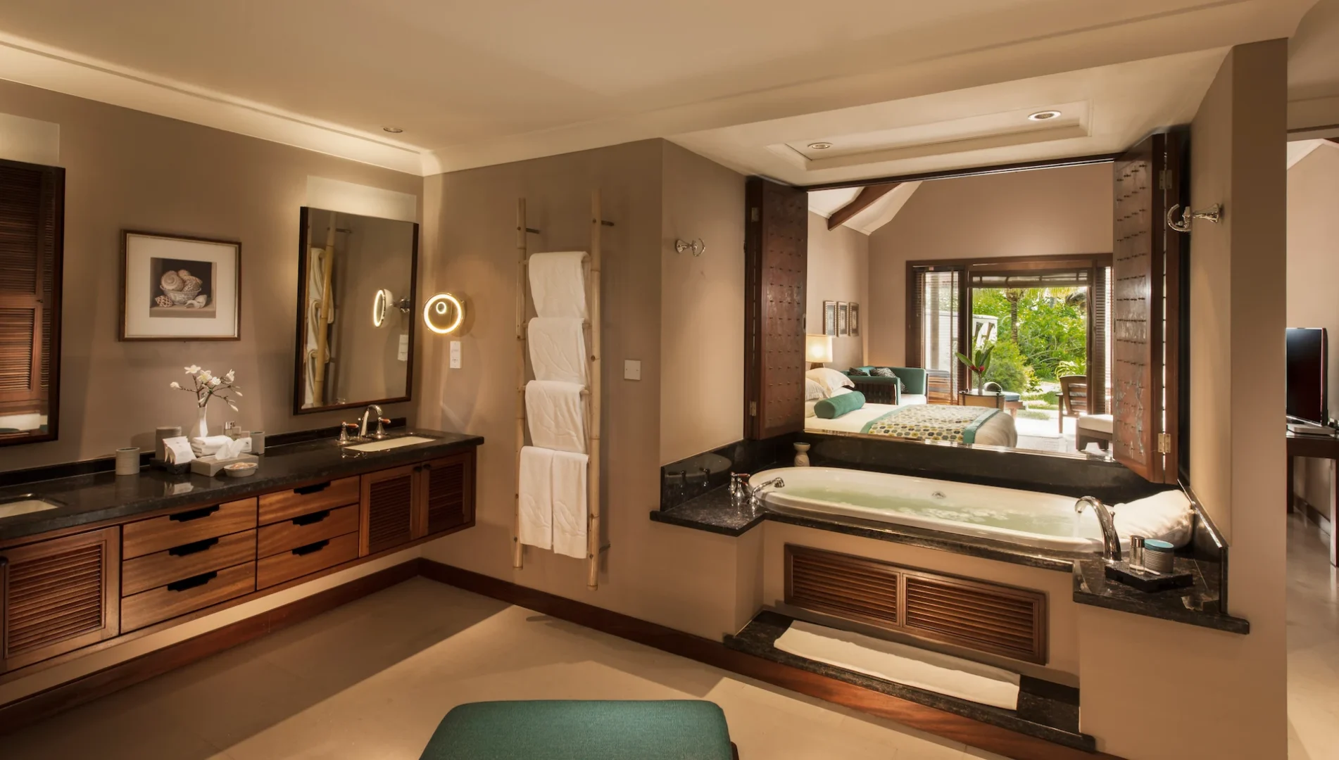 constance lemuria villa room with bedroom living area and private pool view