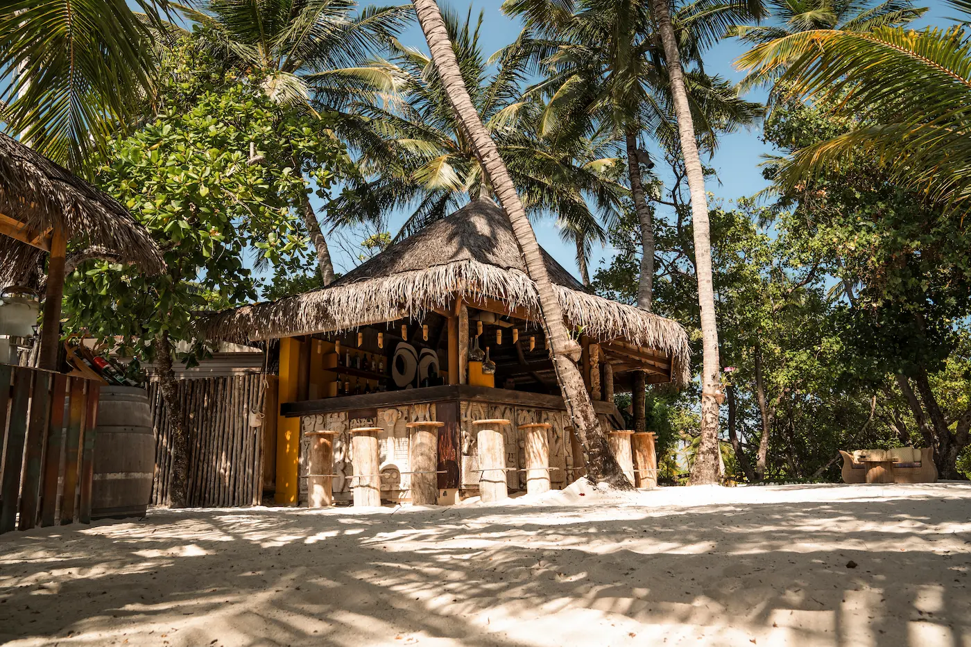 totem bar at constance moofushi maldives offering relaxed beachfront drinks