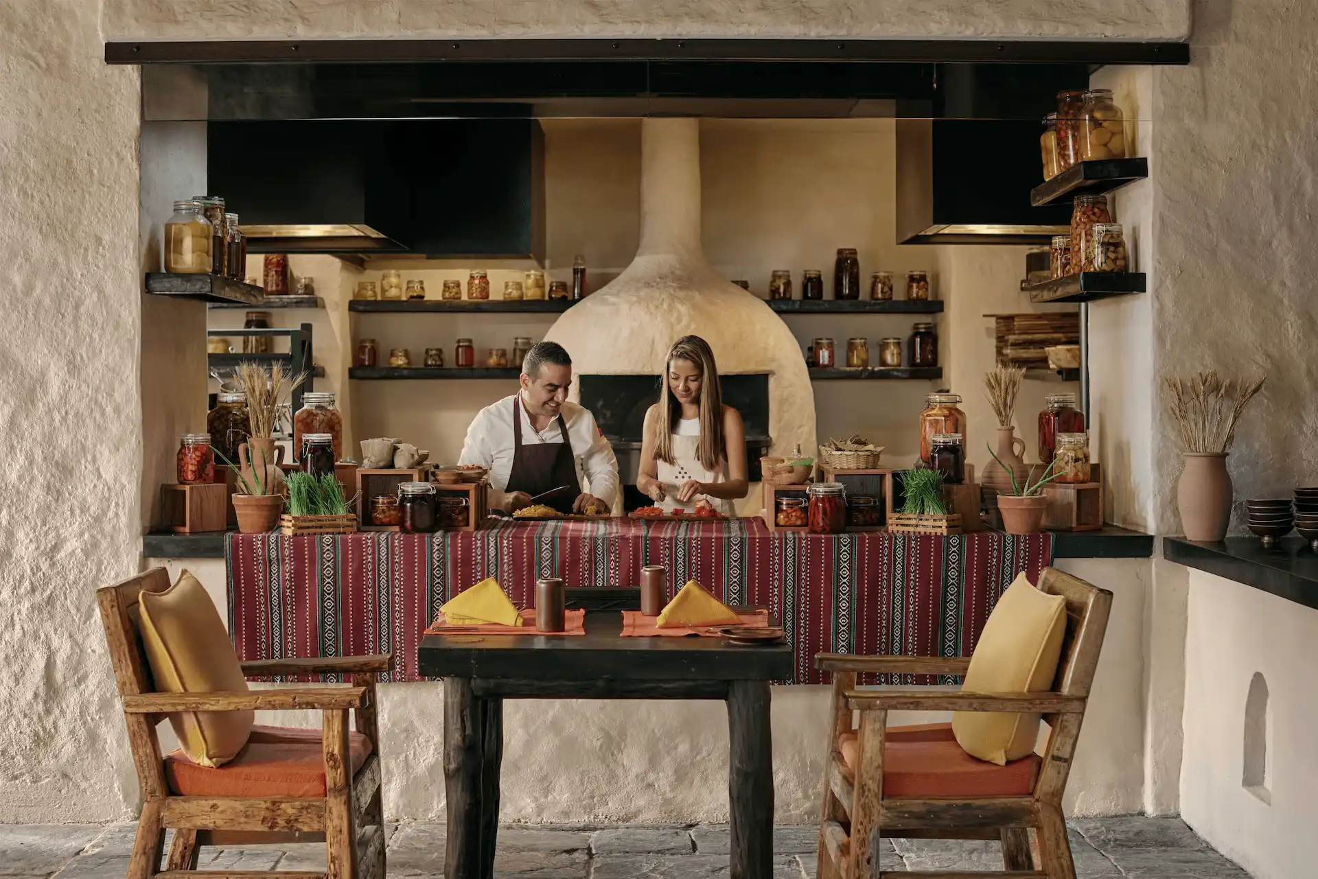 guests participating in a cooking class at six senses zighy bay oman resort