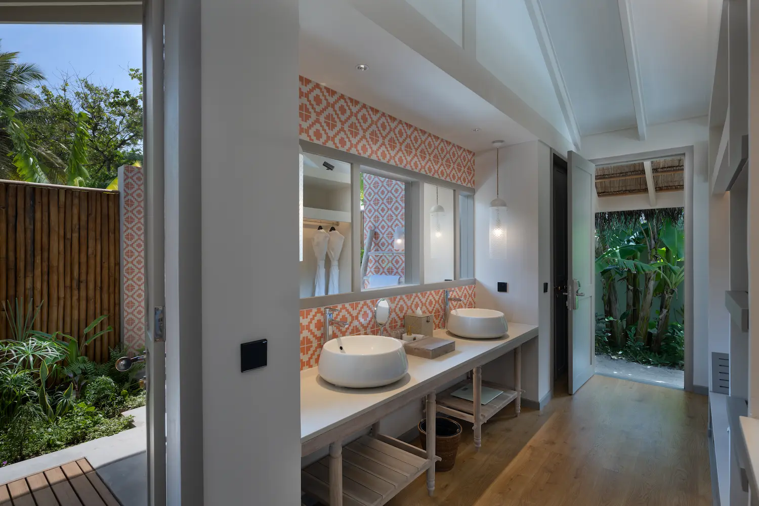 refined beach pool villa vanity view at cora cora maldives with elegant finishes and gentle natural lighting