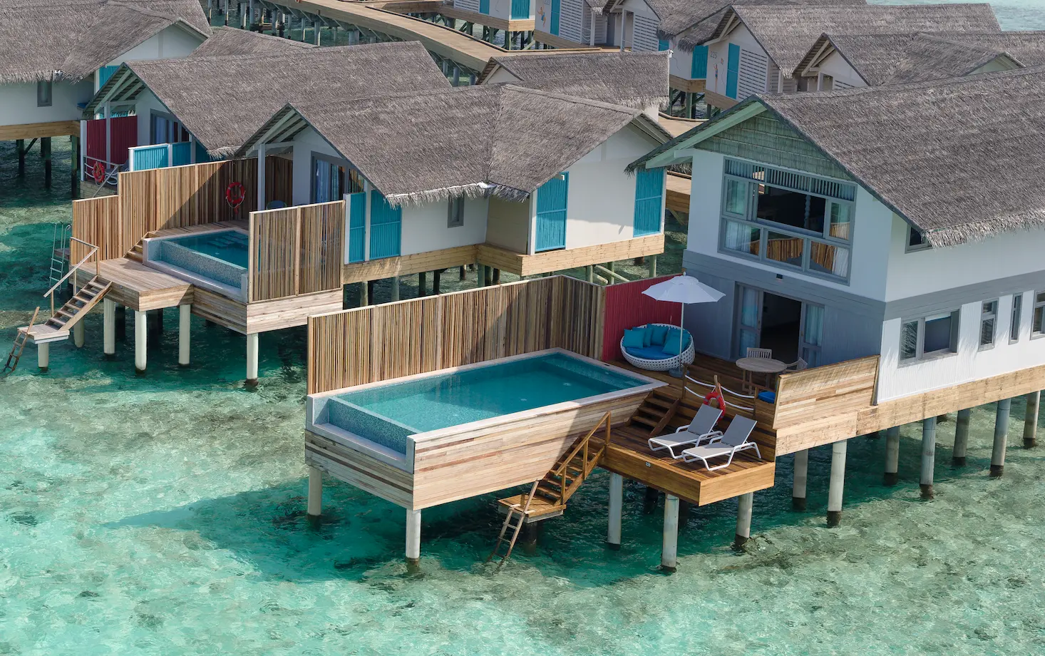 aerial view of the duplex lagoon pool villa at cora cora maldives highlighting its private pool and stunning turquoise lagoon setting
