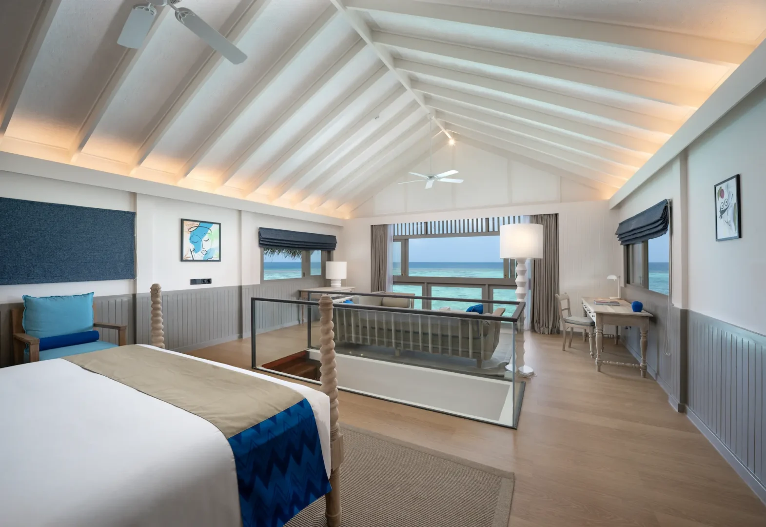 spacious upstairs bedroom of the duplex lagoon pool villa at cora cora maldives featuring calm natural tones and serene lagoon views