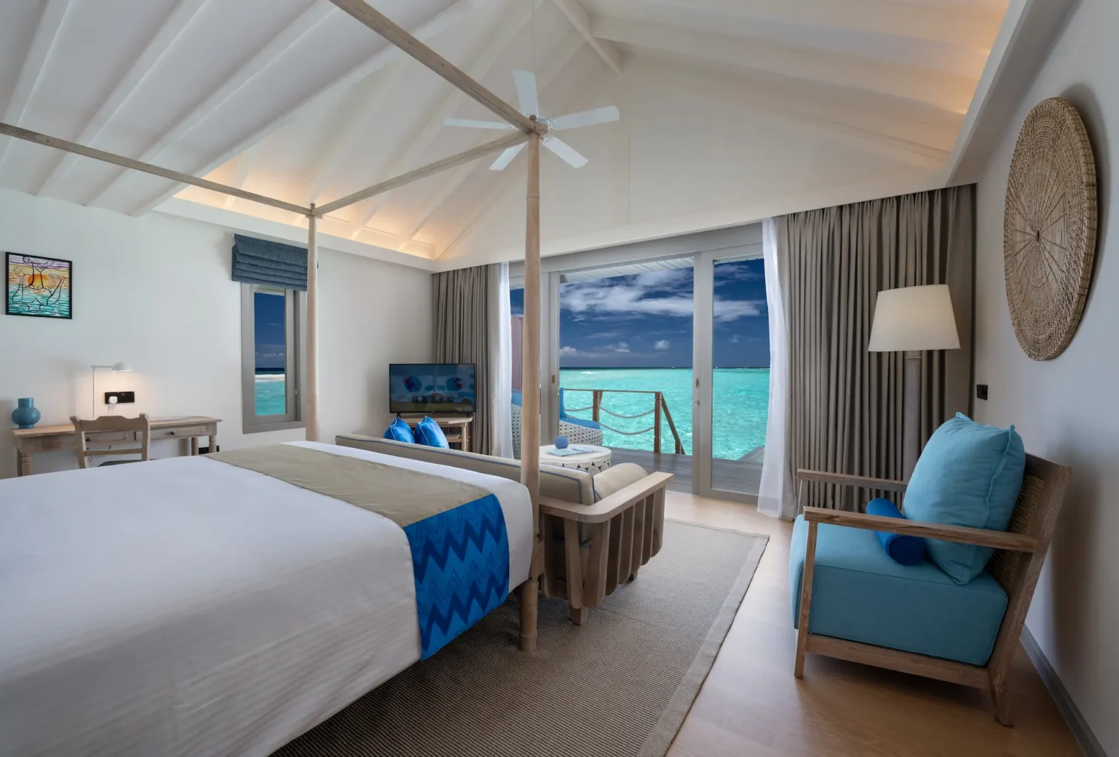 relaxing lagoon villa bedroom at cora cora maldives with soft natural tones and tranquil ocean ambience