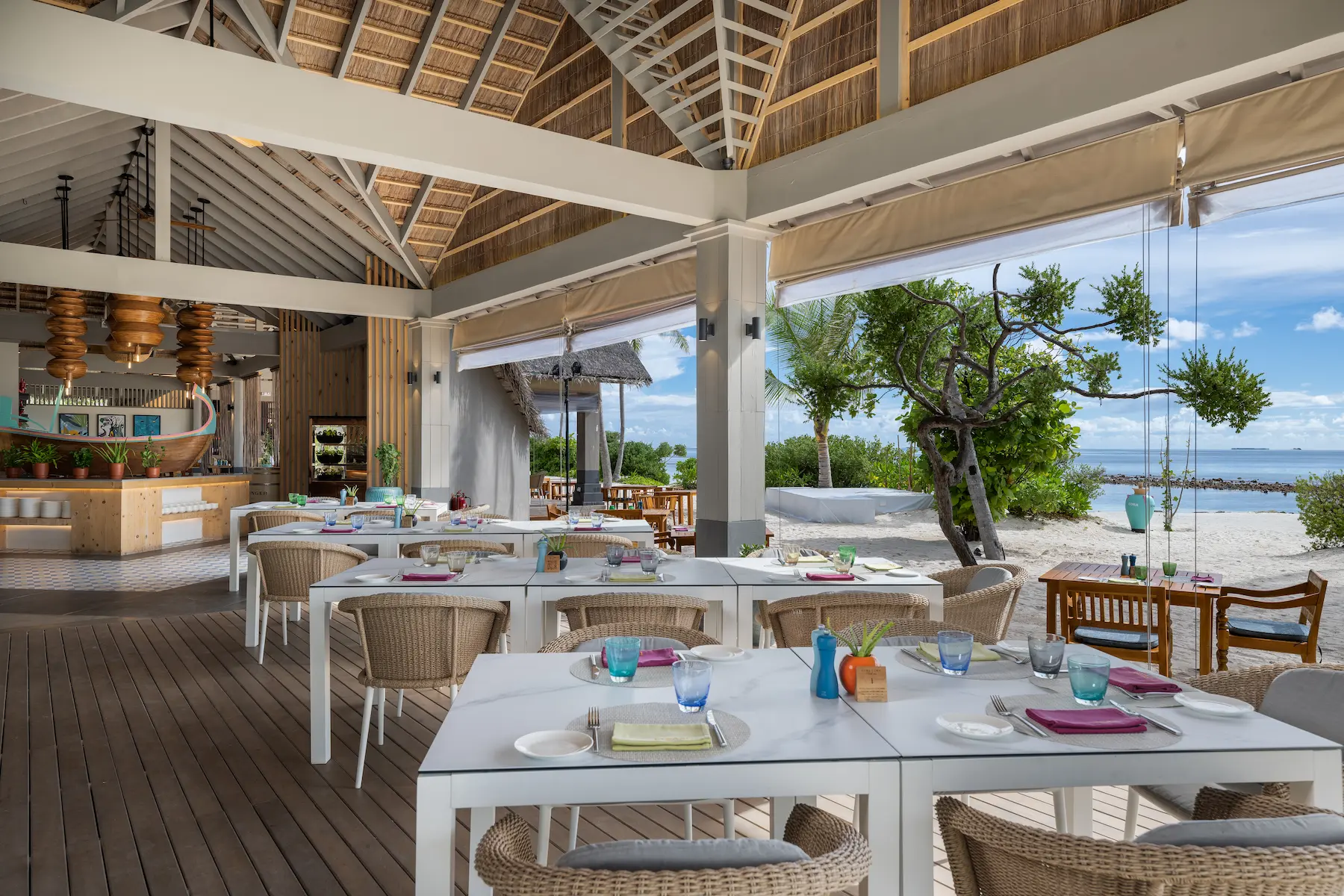 cora cora maldives tazaa restaurant interior featuring contemporary design and relaxed island dining ambience
