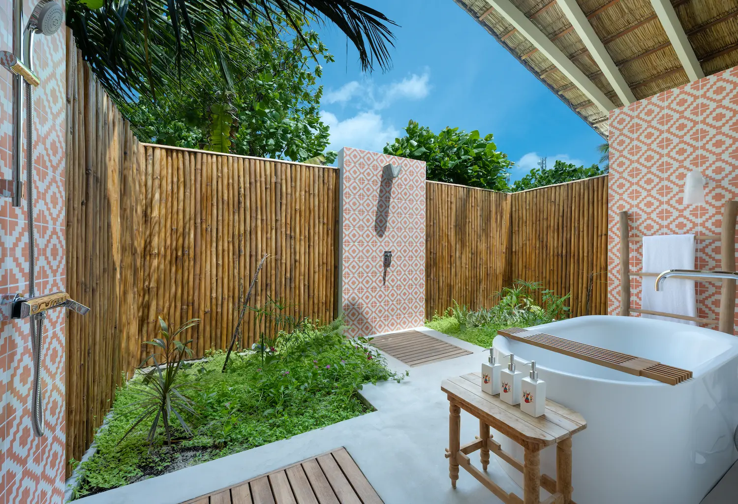 elegant bathroom of the two bedroom family beach pool villa at cora cora maldives featuring refined natural finishes and serene coastal lighting