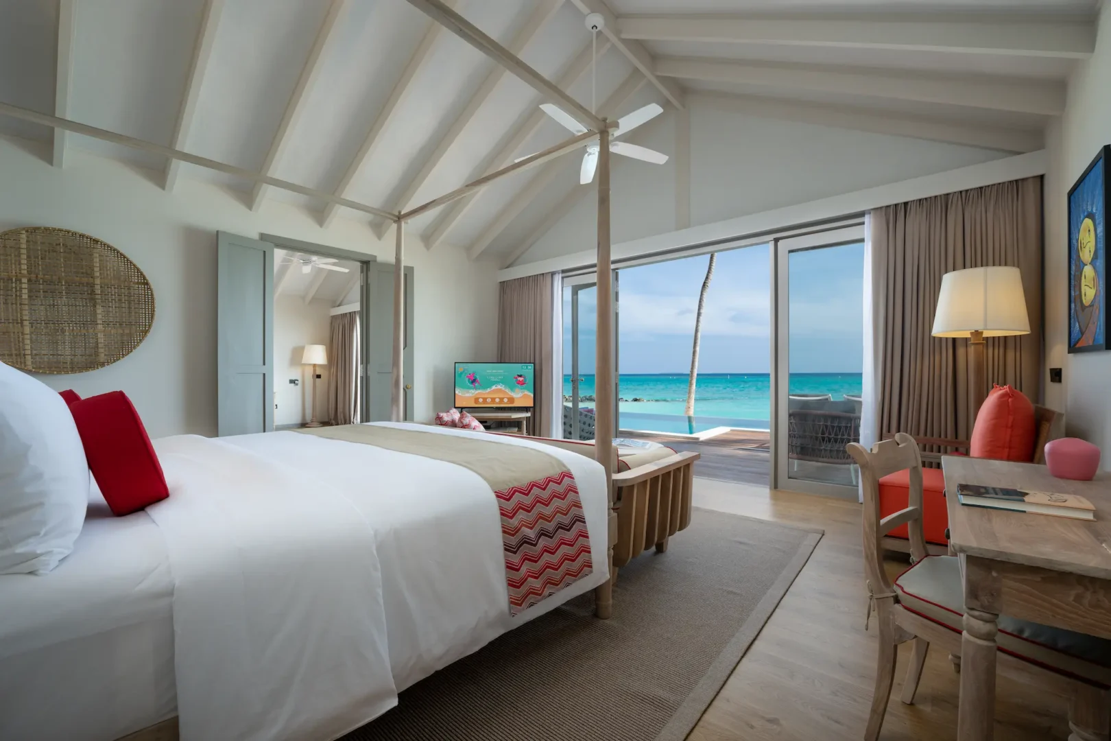 cora cora maldives two bedroom family beach pool villa master bedroom with ocean view and luxury beachfront design