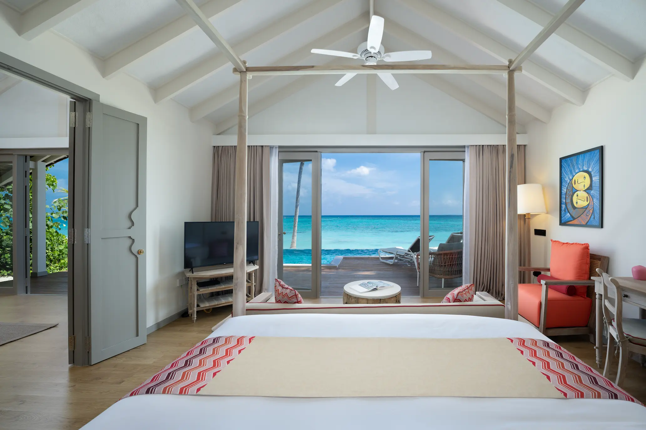 cora cora Maldives two bedroom family beach pool villa master bedroom with beachfront luxury interior, lagoon views, premium amenities and family friendly island accommodation in the Maldives