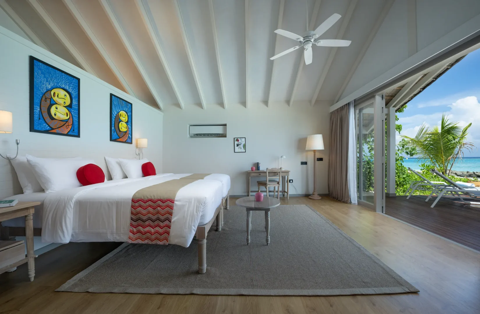 cora cora maldives two bedroom family beach pool villa twin bedroom featuring elegant coastal design and serene beachfront ambience