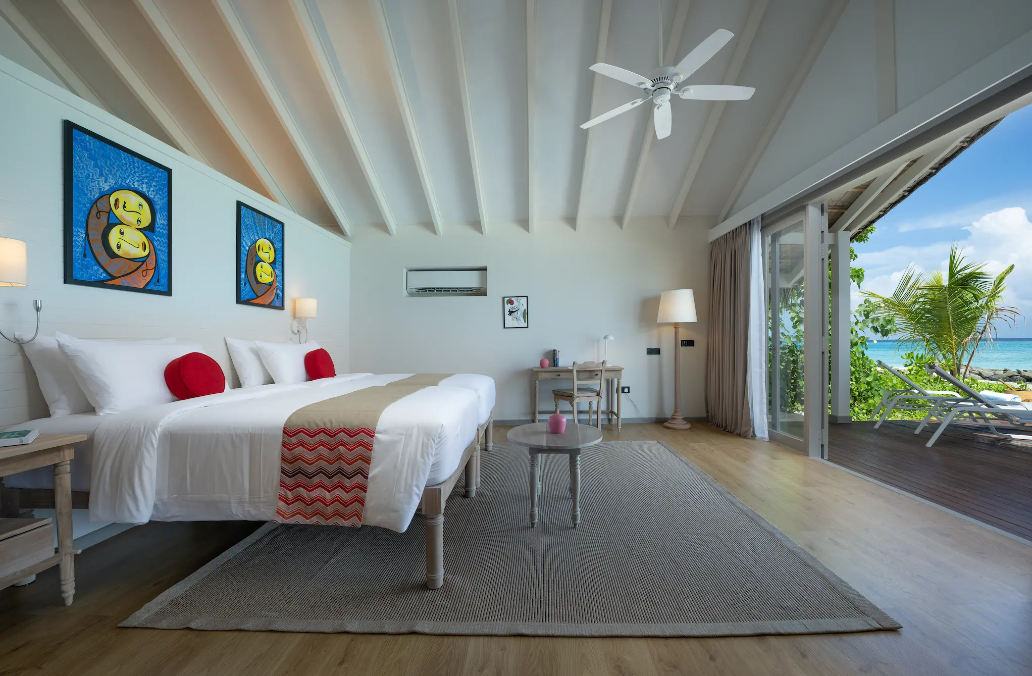 cora cora maldives two bedroom family beach pool villa twin bedroom featuring elegant coastal design and serene beachfront ambience