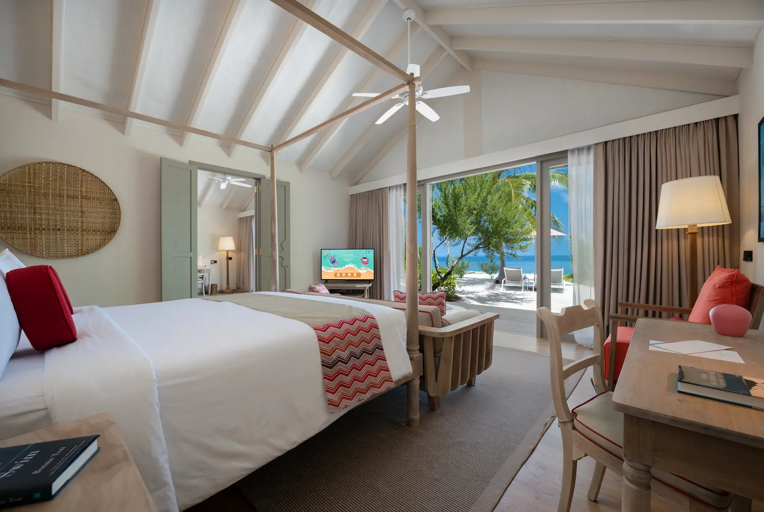 master bedroom bed in the two bedroom family beach villa at cora cora maldives featuring soft natural textures and a calm coastal atmosphere