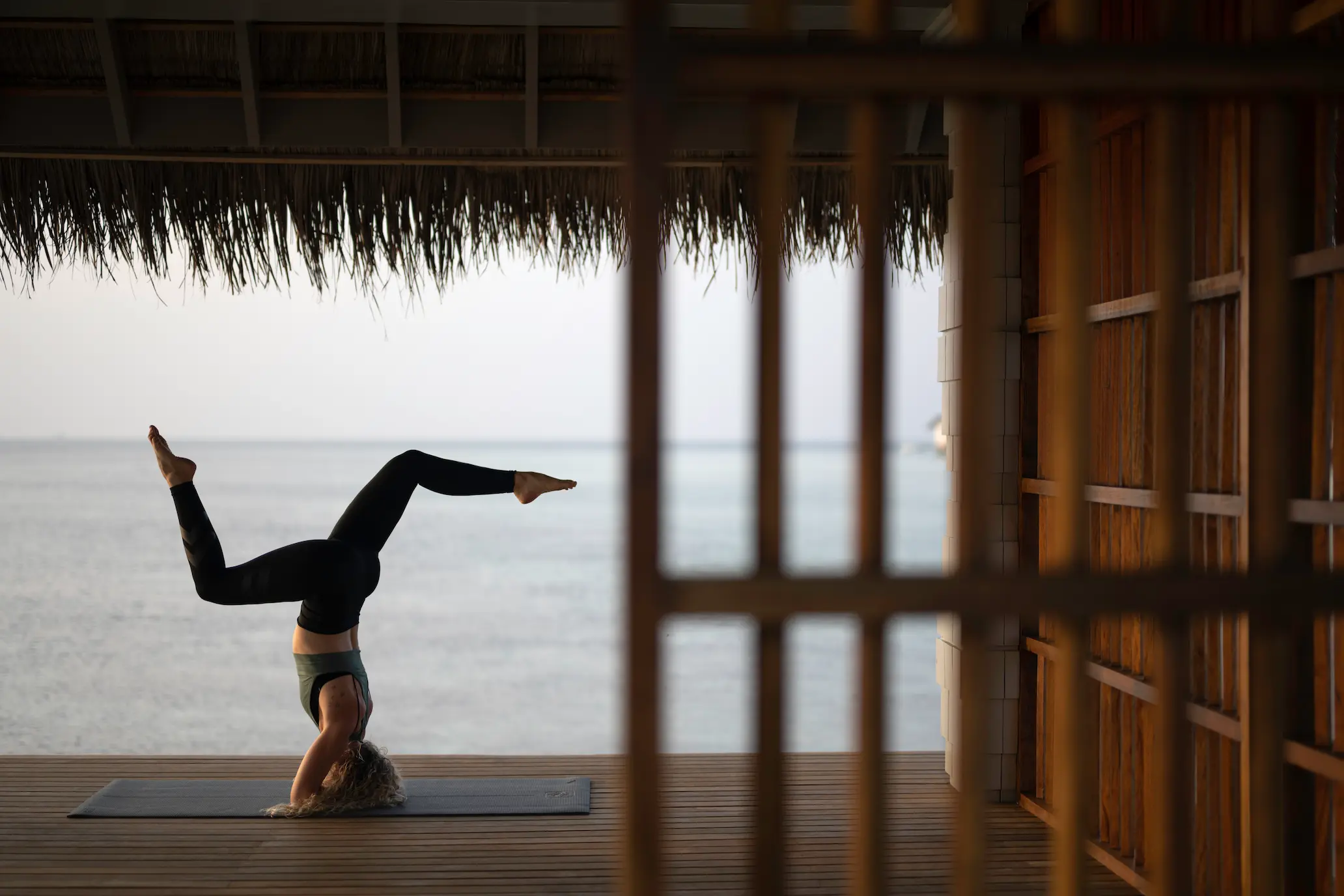cora cora maldives yoga session on the beach with tranquil island ambience and serene maldives wellness atmosphere