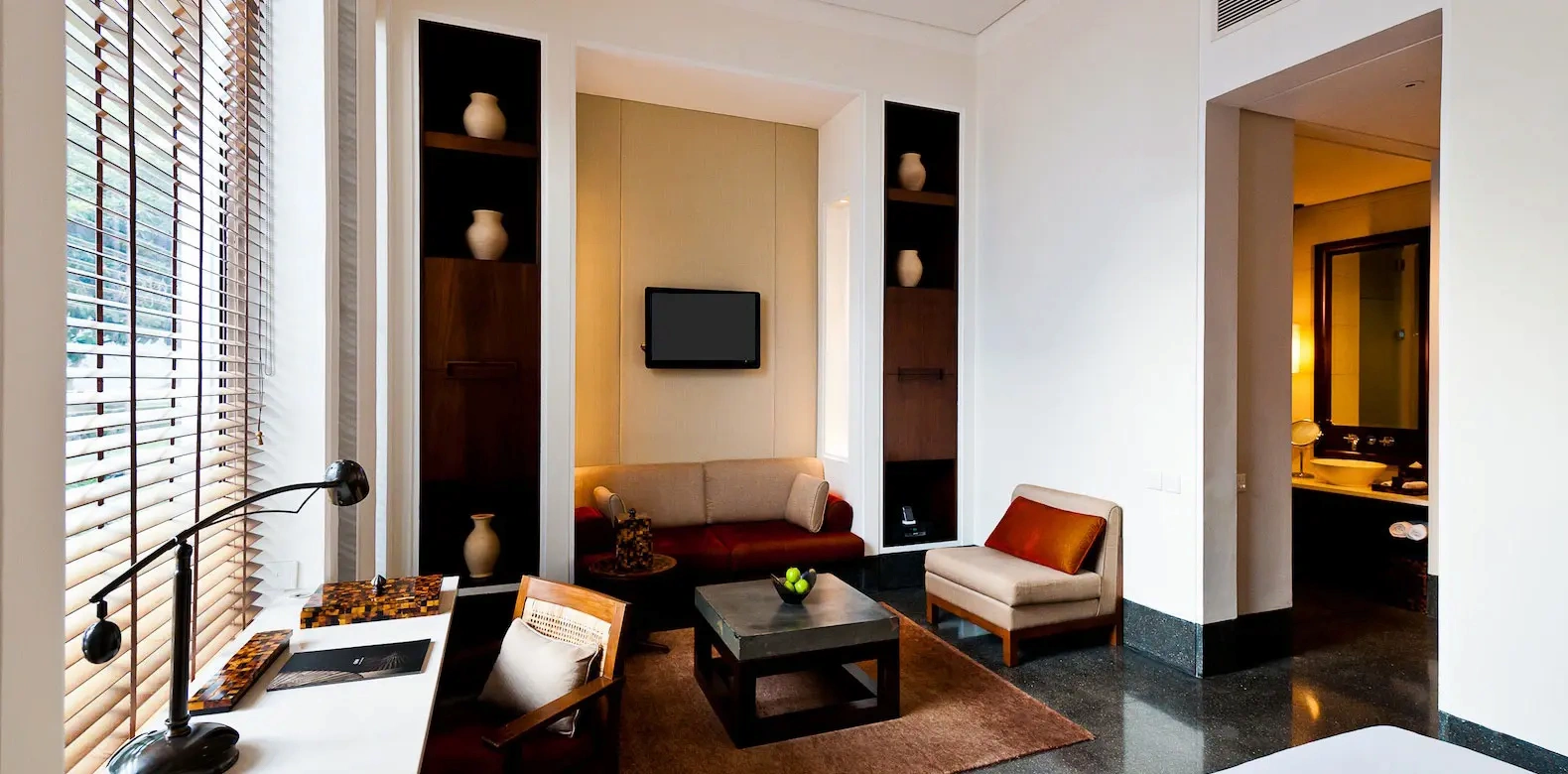 deluxe room lounge at the chedi muscat oman
