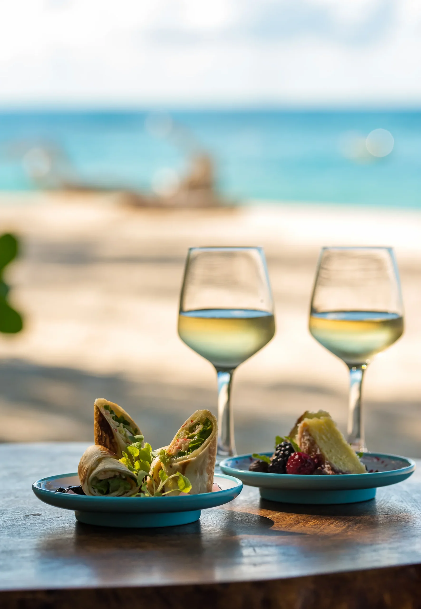 denis private island seychelles the bar with relaxed lounge seating, tropical décor, and panoramic ocean or beach views for cocktails and refreshments
