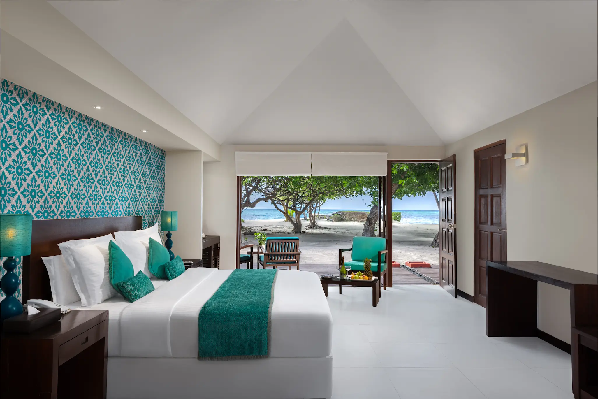 family beach villa interior lounge at adaaran select hudhuranfushi maldives