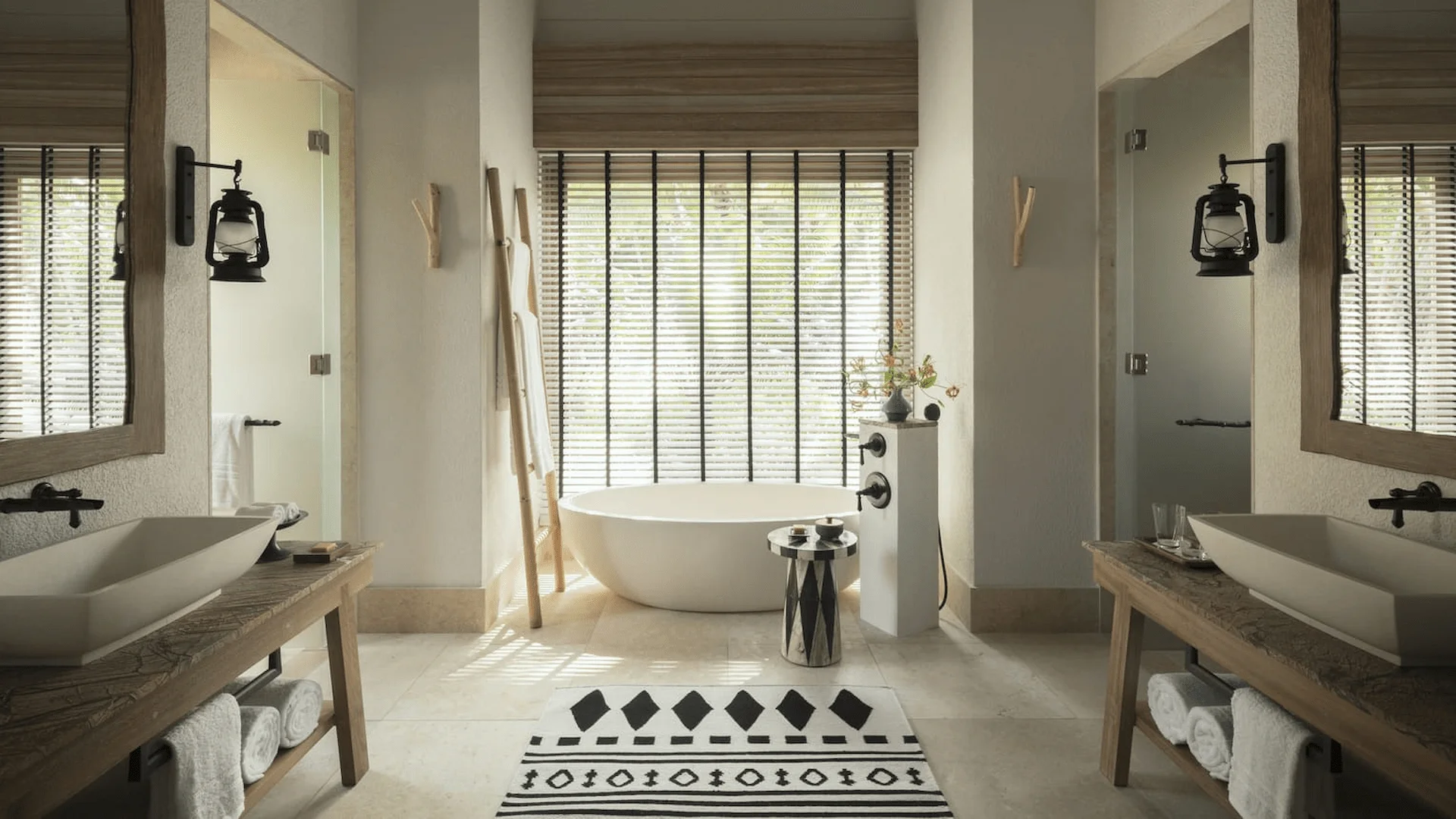 bathroom in an ocean view pool villa at four seasons resort desroches seychelles with bathtub and modern fittings