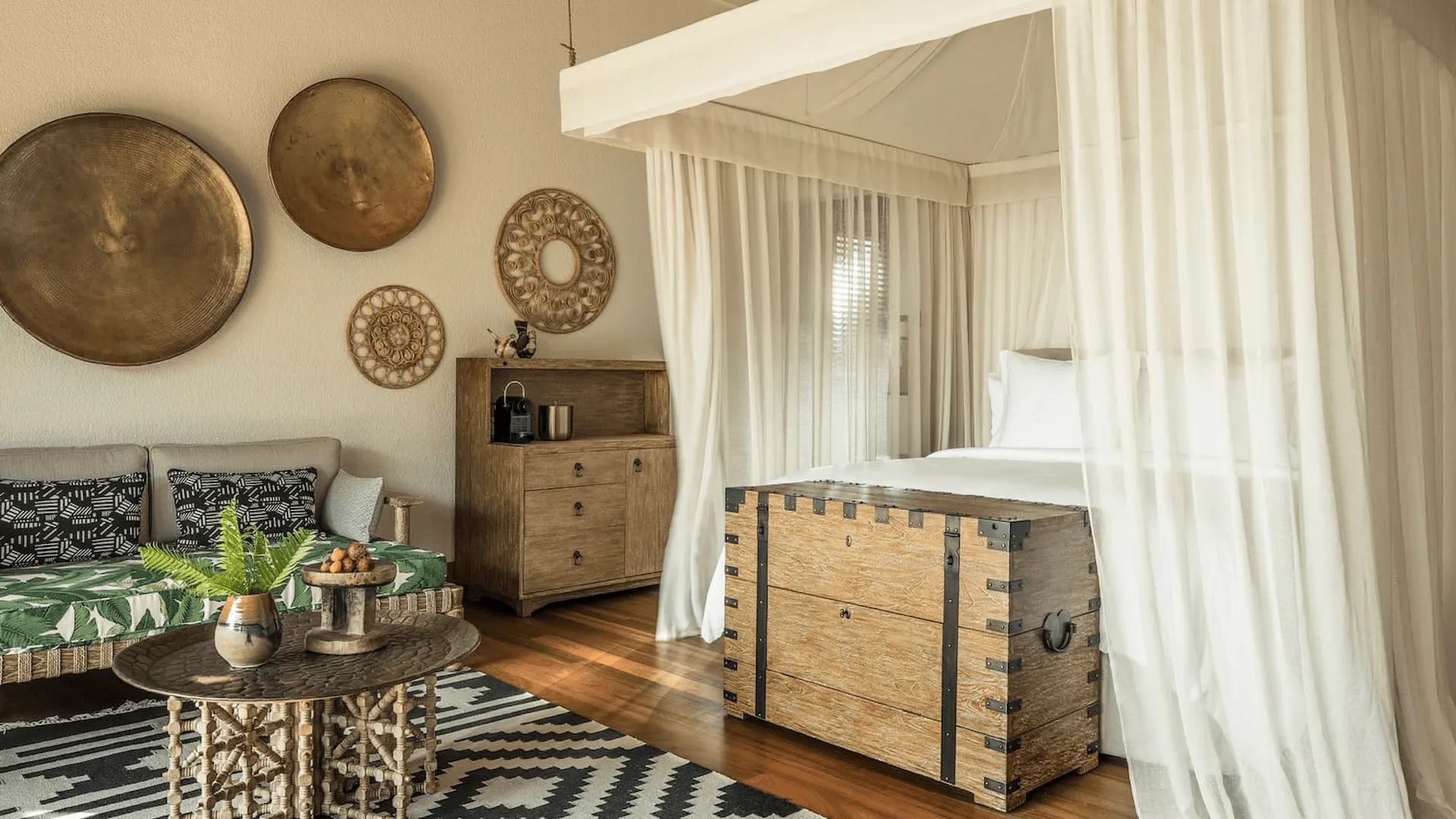 bedroom in an ocean view pool villa at four seasons resort desroches seychelles with views of the ocean