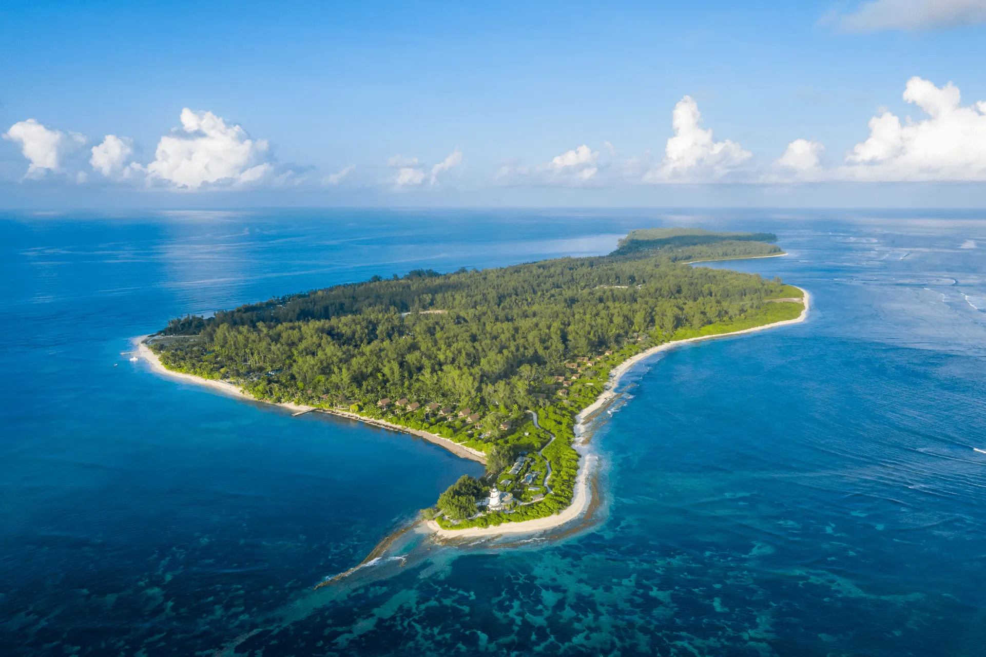 aerial view of desroches island and surrounding turquoise waters at four seasons resort seychelles
