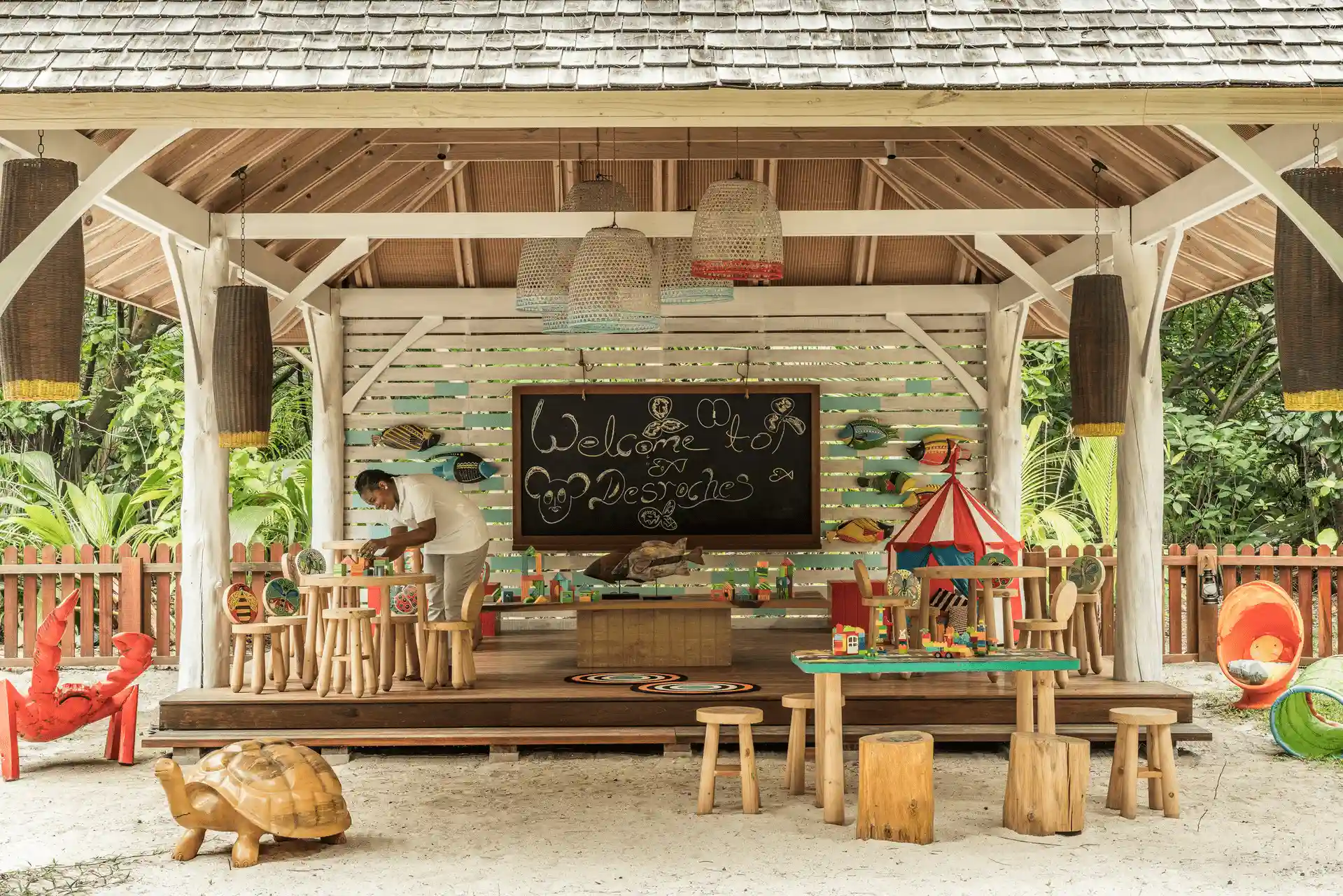children enjoying activities at the kids club at four seasons resort desroches seychelles