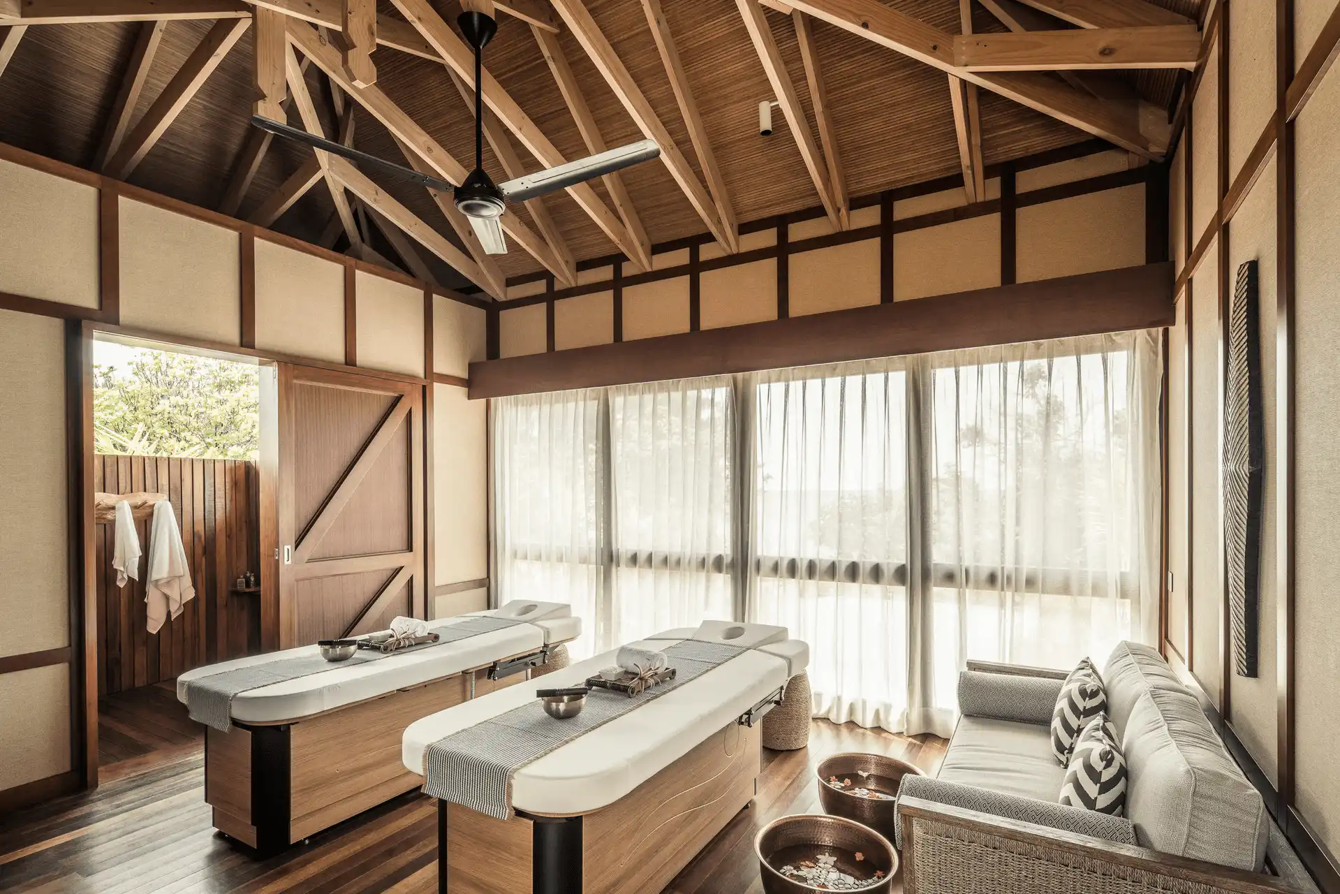 spa at four seasons resort desroches seychelles with treatment rooms and tropical decor