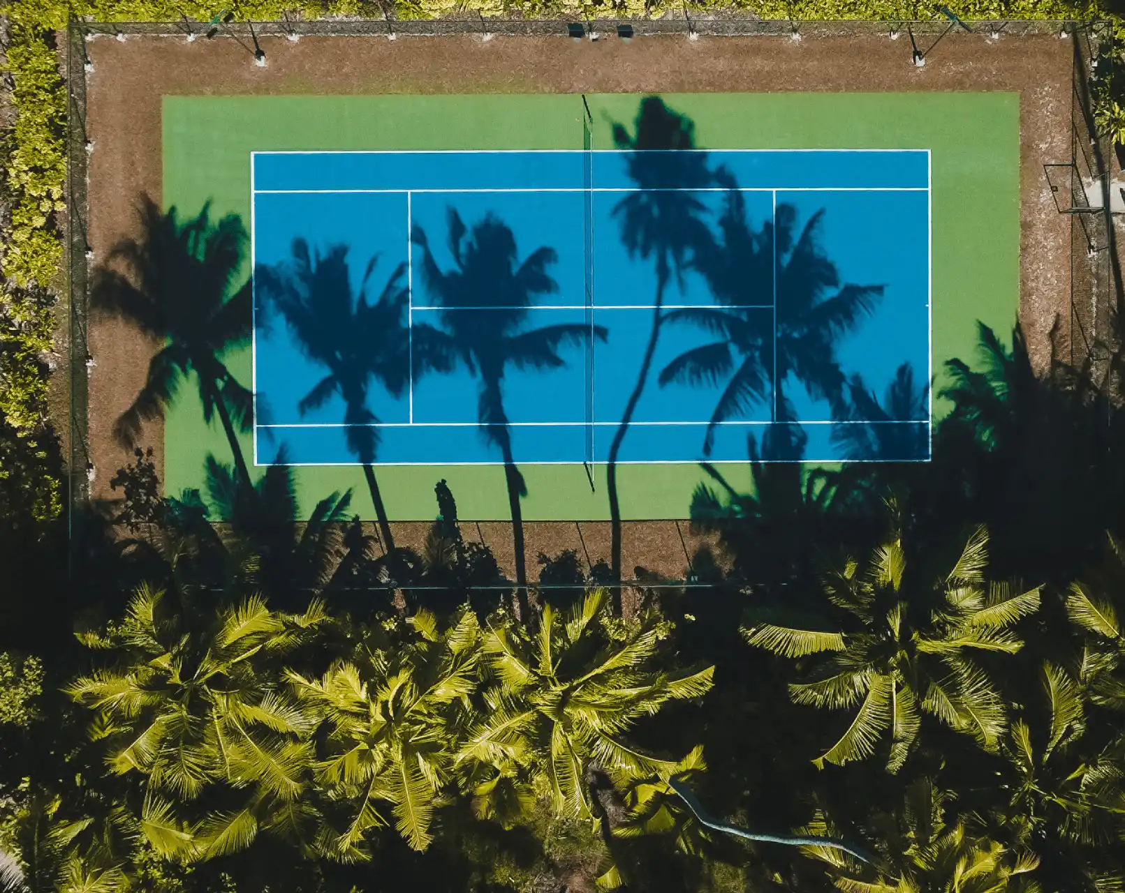 tennis court at four seasons resort desroches seychelles