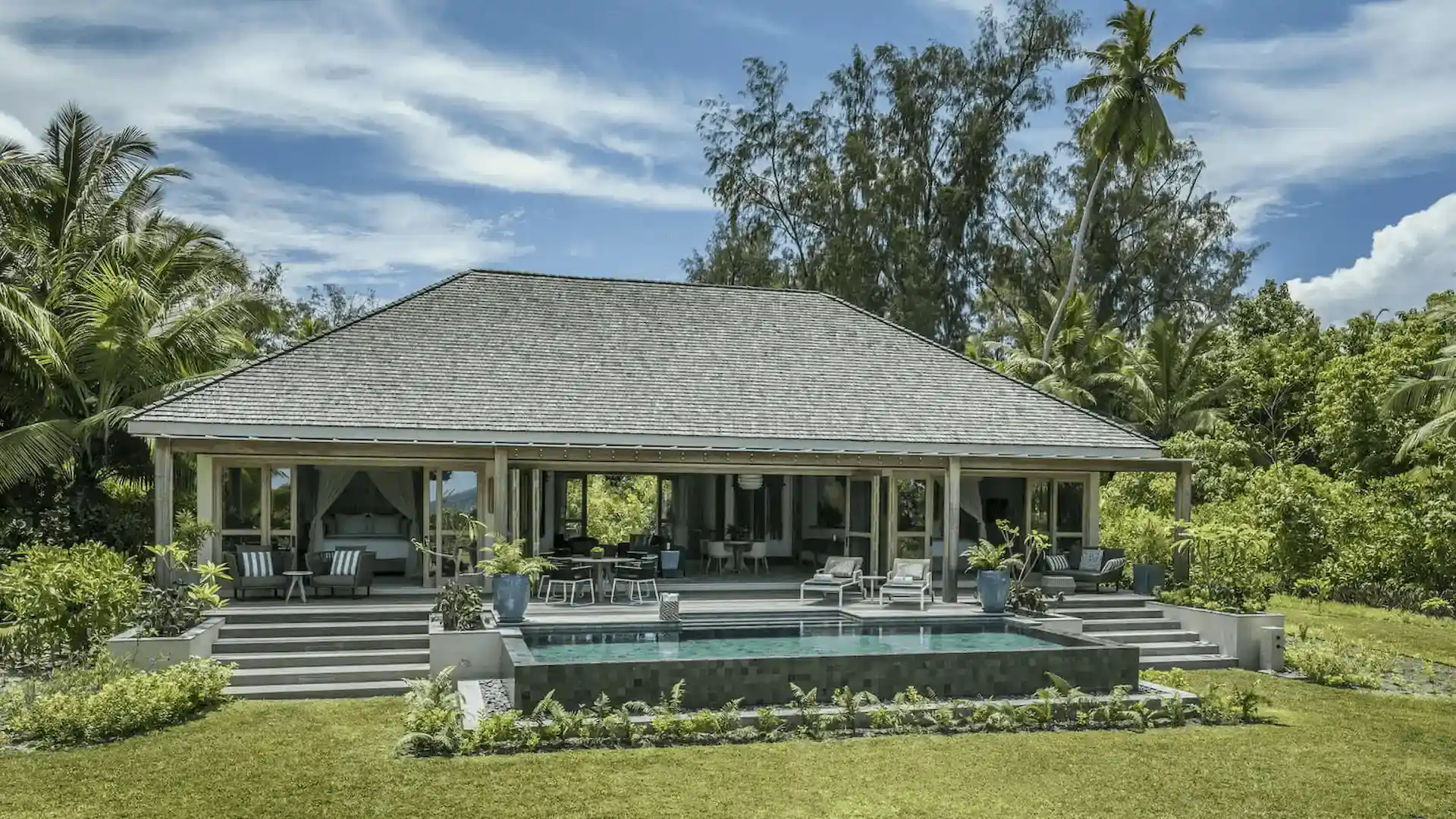 exterior of a two bedroom presidential villa at four seasons resort desroches seychelles