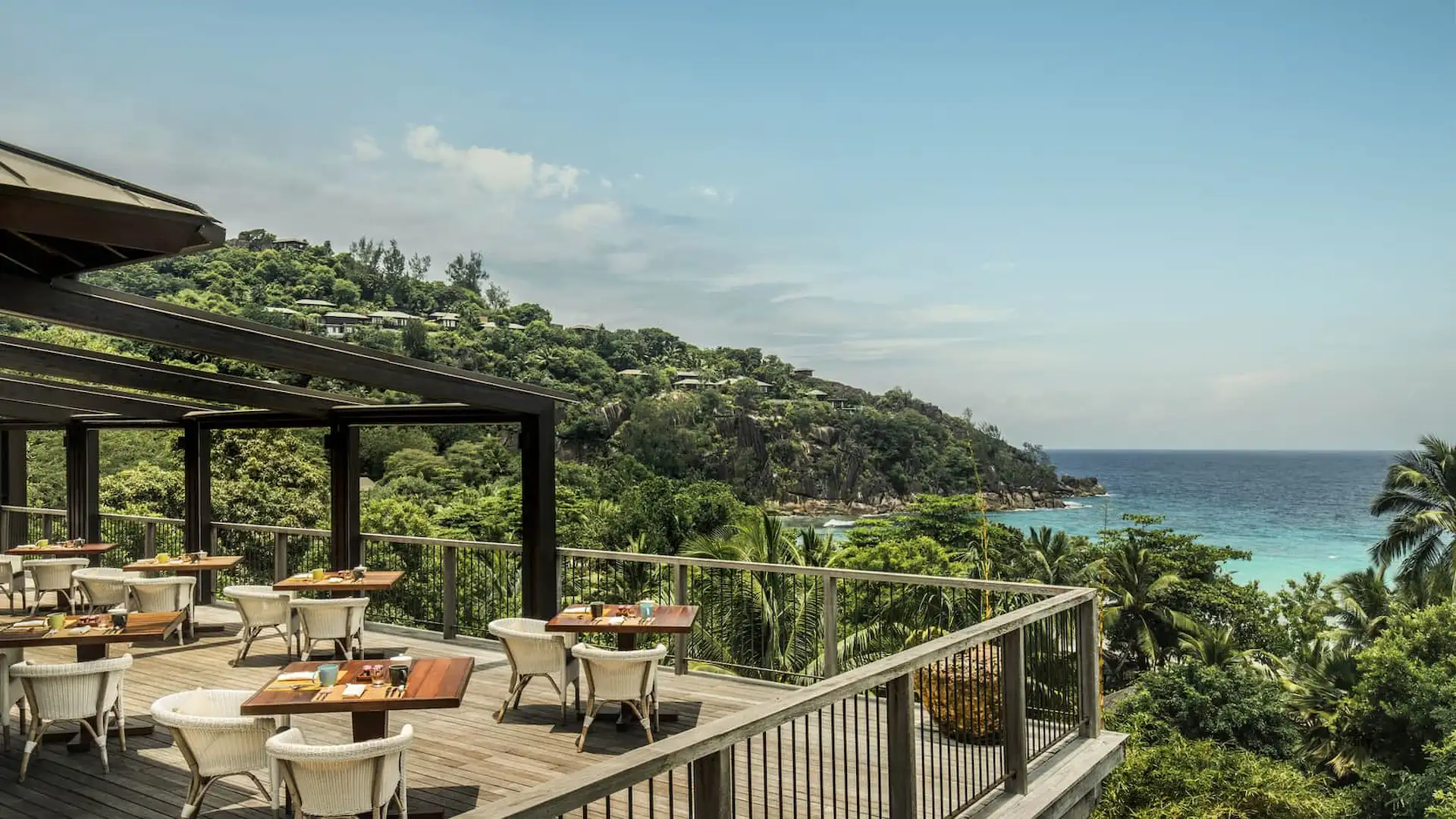 zez bar and lounge at Four Seasons Resort Seychelles with relaxed seating and oceanfront views in a tropical setting