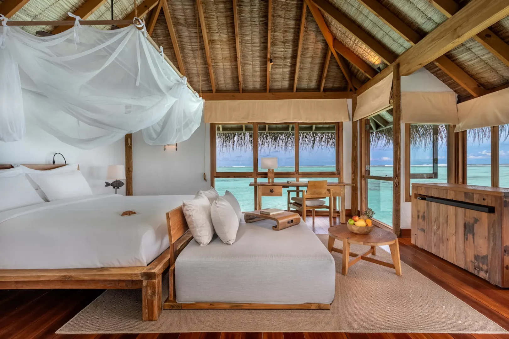 a tranquil crusoe residence bedroom at gili lankanfushi maldives featuring soft natural textures and peaceful lagoon views