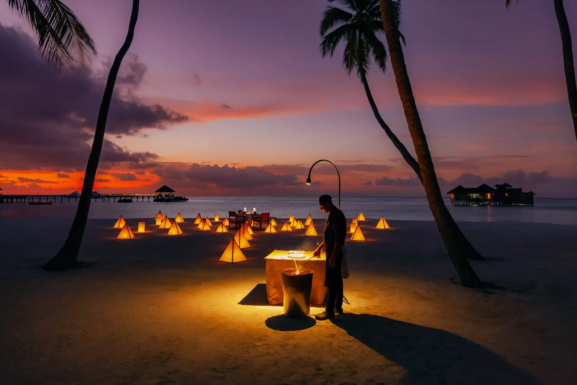 a romantic destination dining by the beach experience at gili lankanfushi maldives set along soft sands and calm lagoon waters