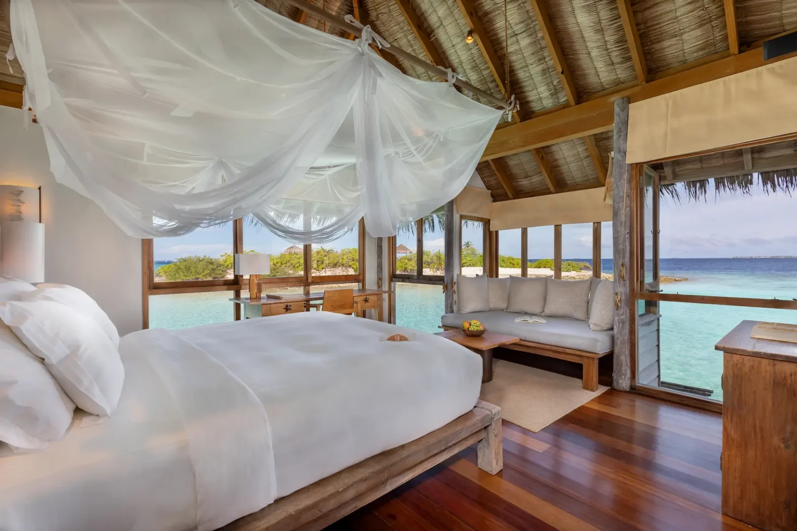a peaceful family villa second bedroom with view at gili lankanfushi maldives overlooking the calm turquoise lagoon