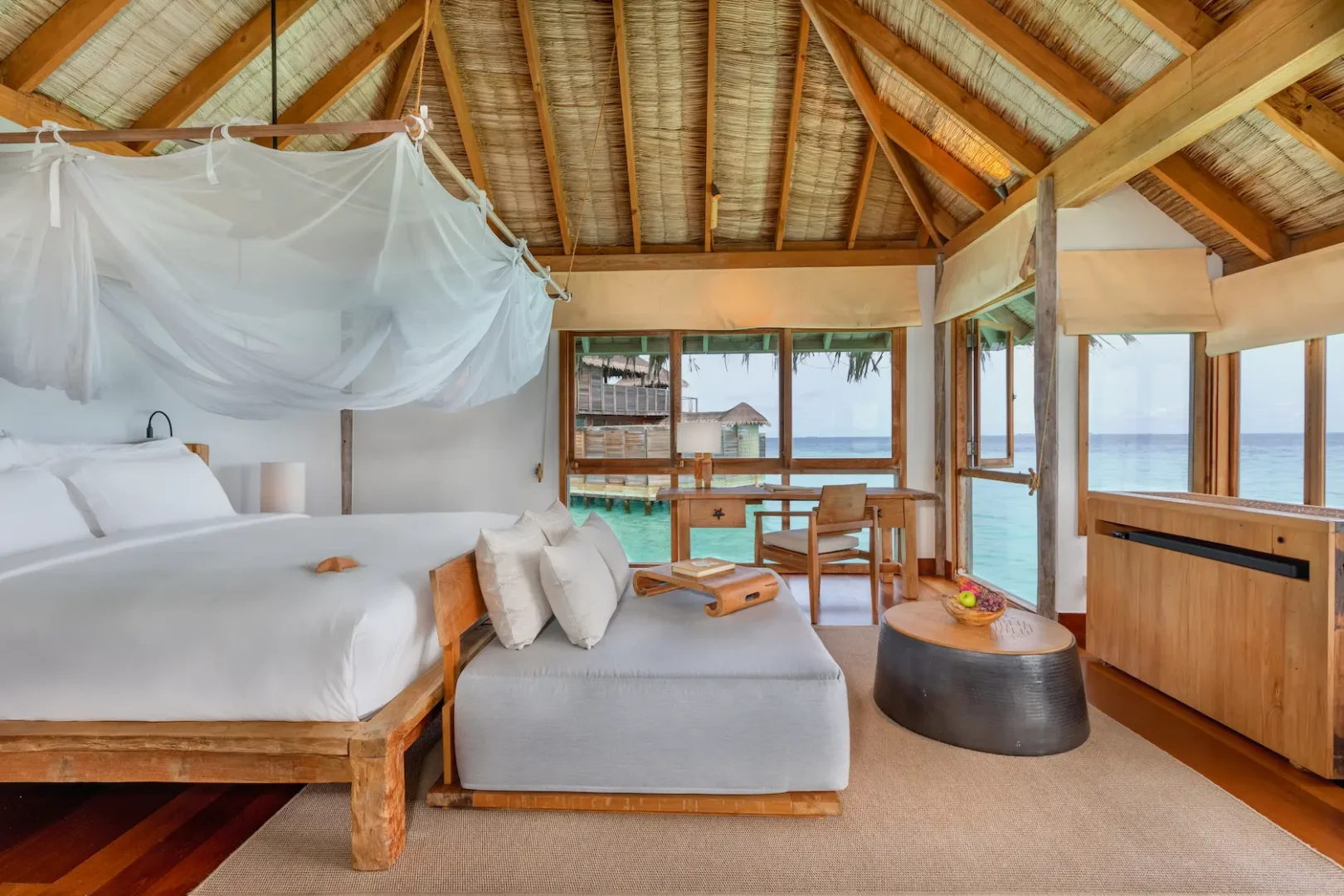 a tranquil gili lagoon residence bedroom at gili lankanfushi maldives featuring soft natural textures and serene lagoon views